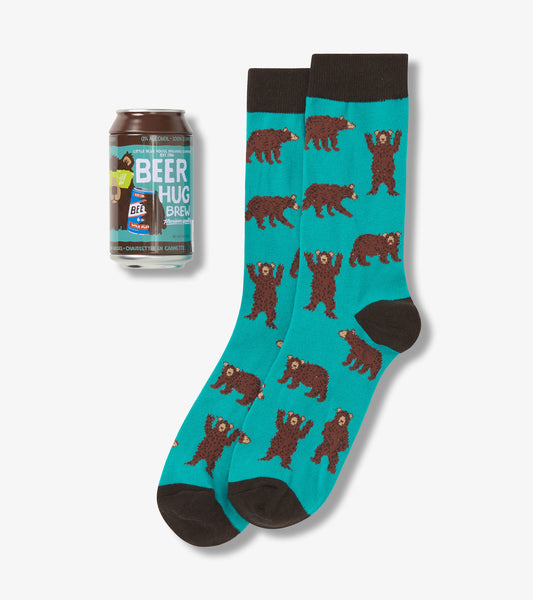 Turquoise socks featuring brown bears in various poses, with a dark brown cuff and toe. A beer can is also visible.