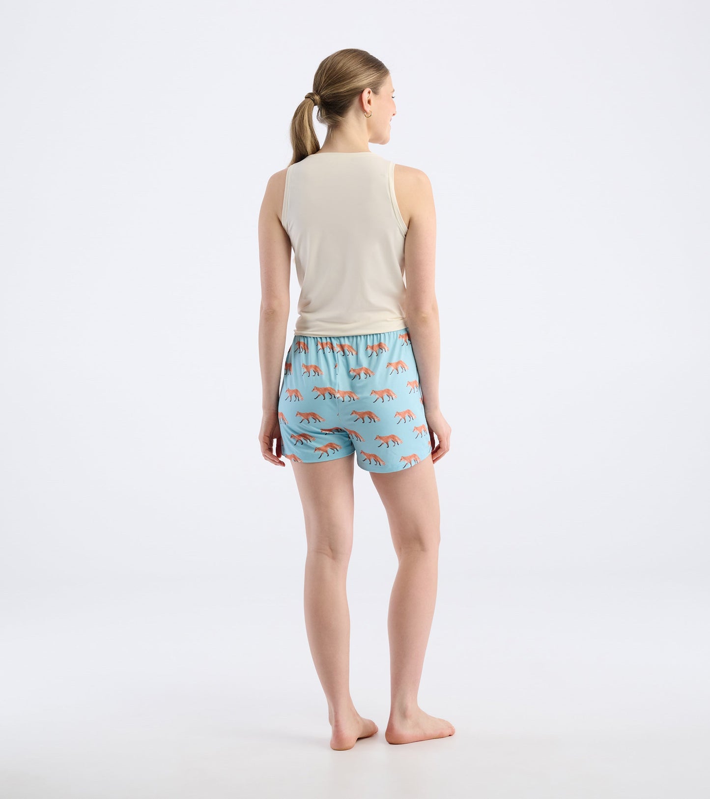 Light blue pajama shorts with a playful fox print, featuring an elastic waistband and a relaxed fit.