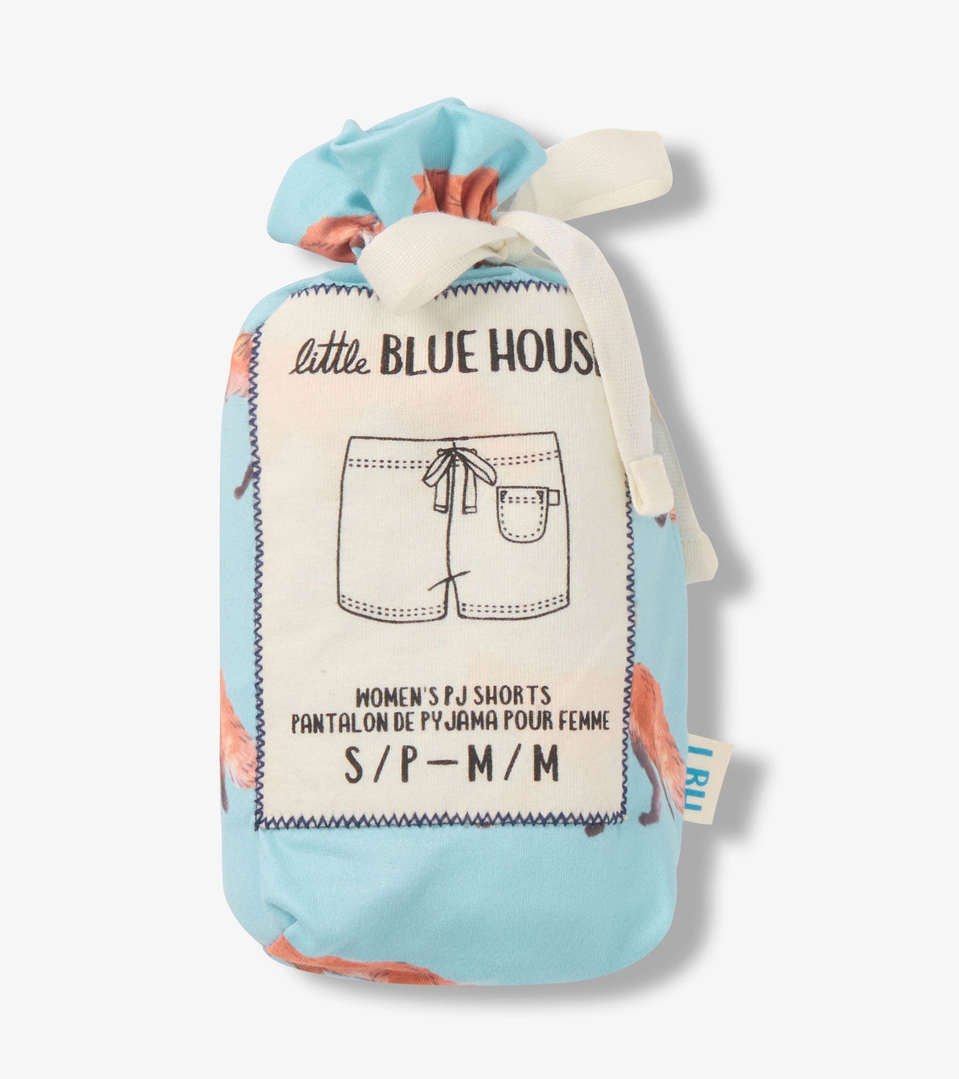 Light blue pajama shorts featuring a watercolor fox pattern, packaged in a drawstring bag. Size options available.