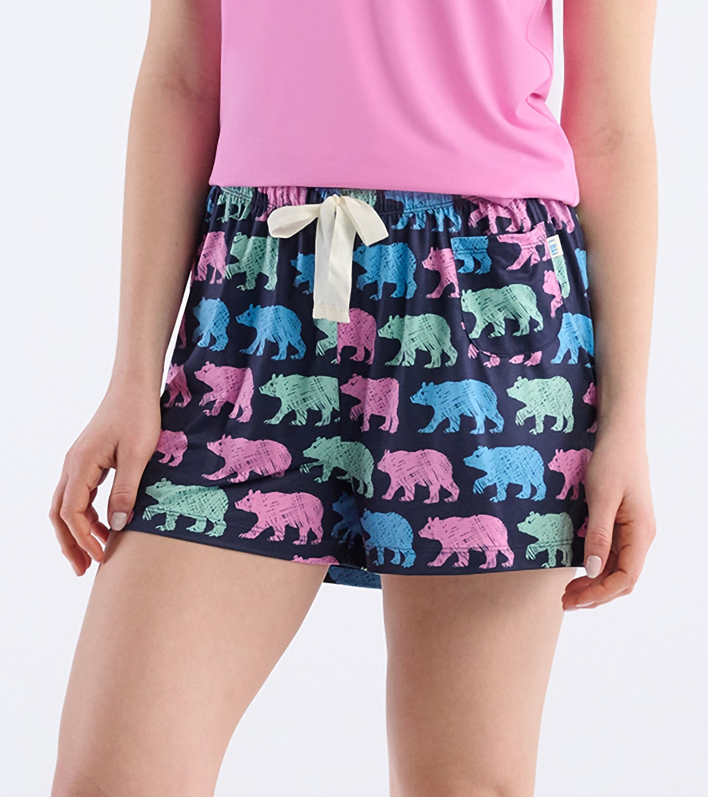 Navy pajama shorts featuring colorful bear patterns and a drawstring waistband, ideal for casual lounging.