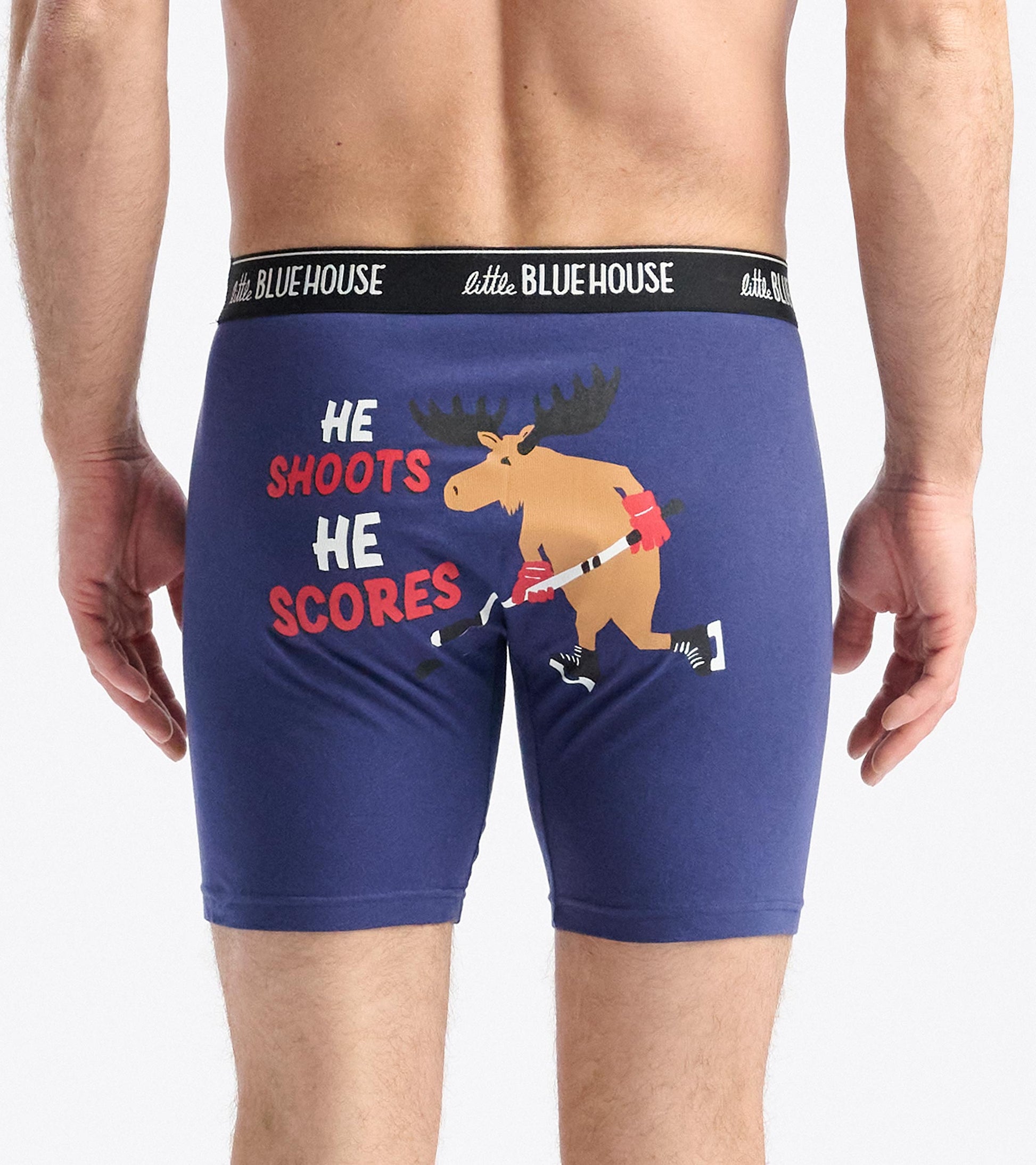 Navy boxer briefs featuring a playful moose graphic with the text "He Shoots He Scores" on the back.