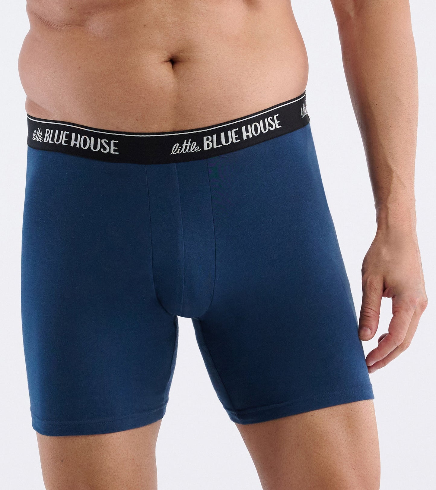 Navy blue men's boxer briefs with a black waistband, featuring a snug fit and soft material.