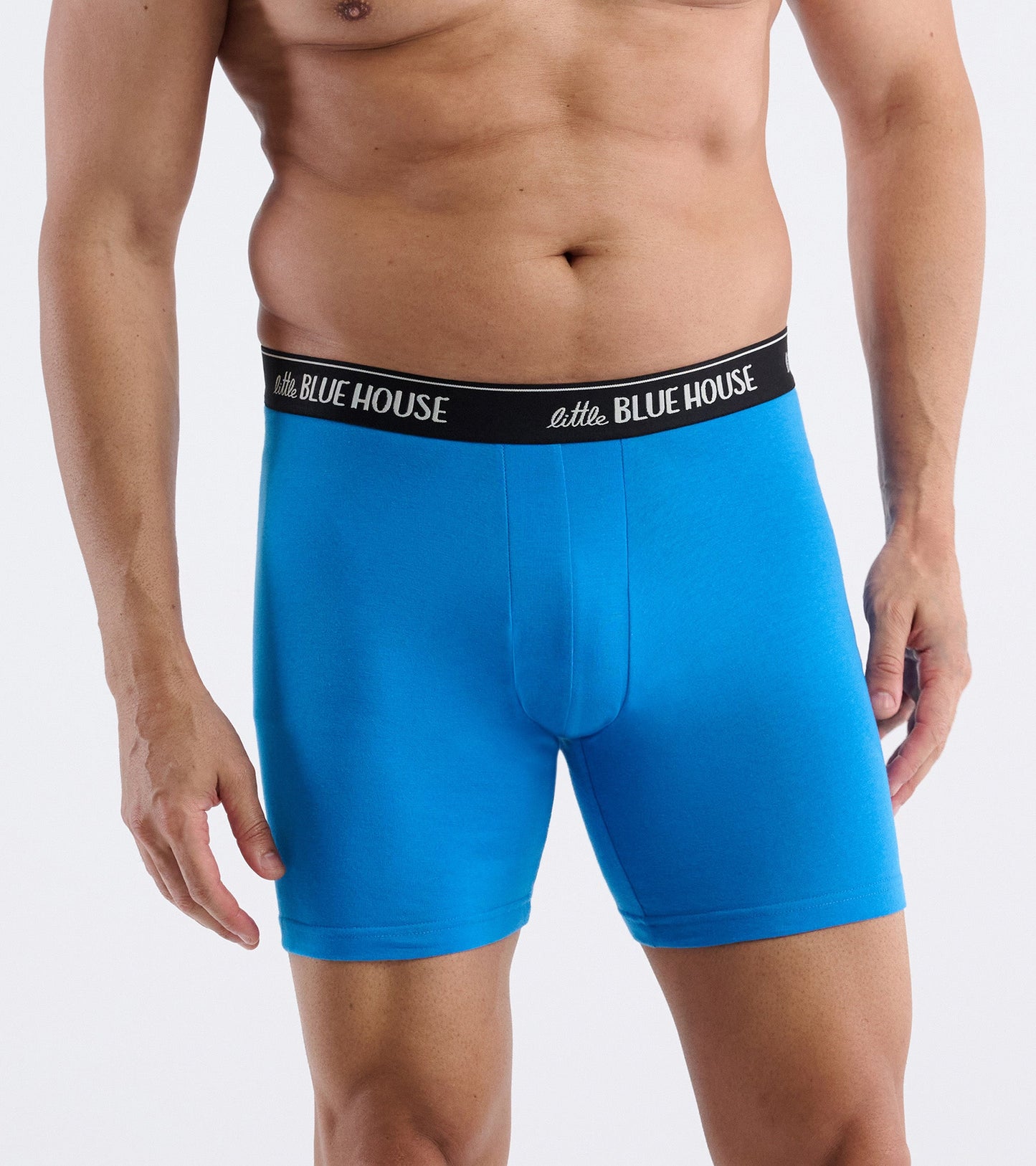 Bright blue boxer briefs with a black waistband, featuring a snug fit and a smooth fabric.