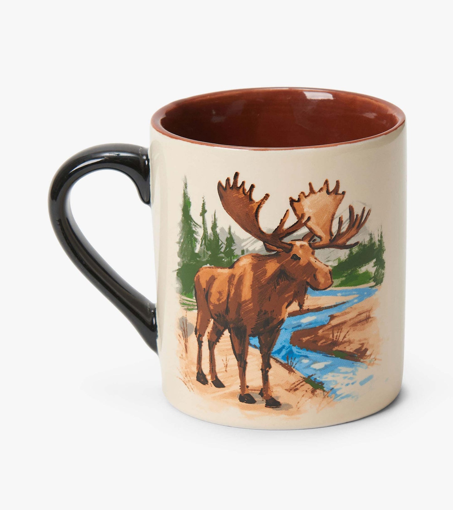 Ceramic mug with black handle, brown interior, and moose illustration by a river and trees
