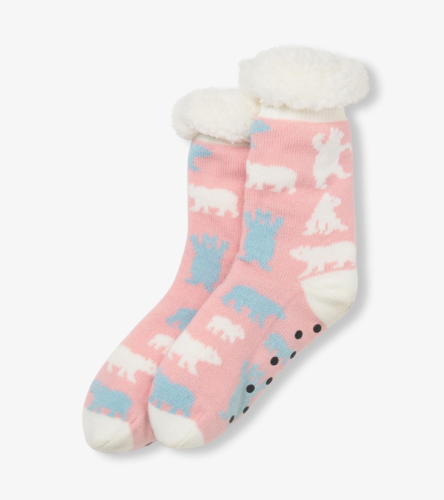 Pink cabin socks featuring polar bear patterns, with a soft white sherpa lining at the cuff. One size fits most.