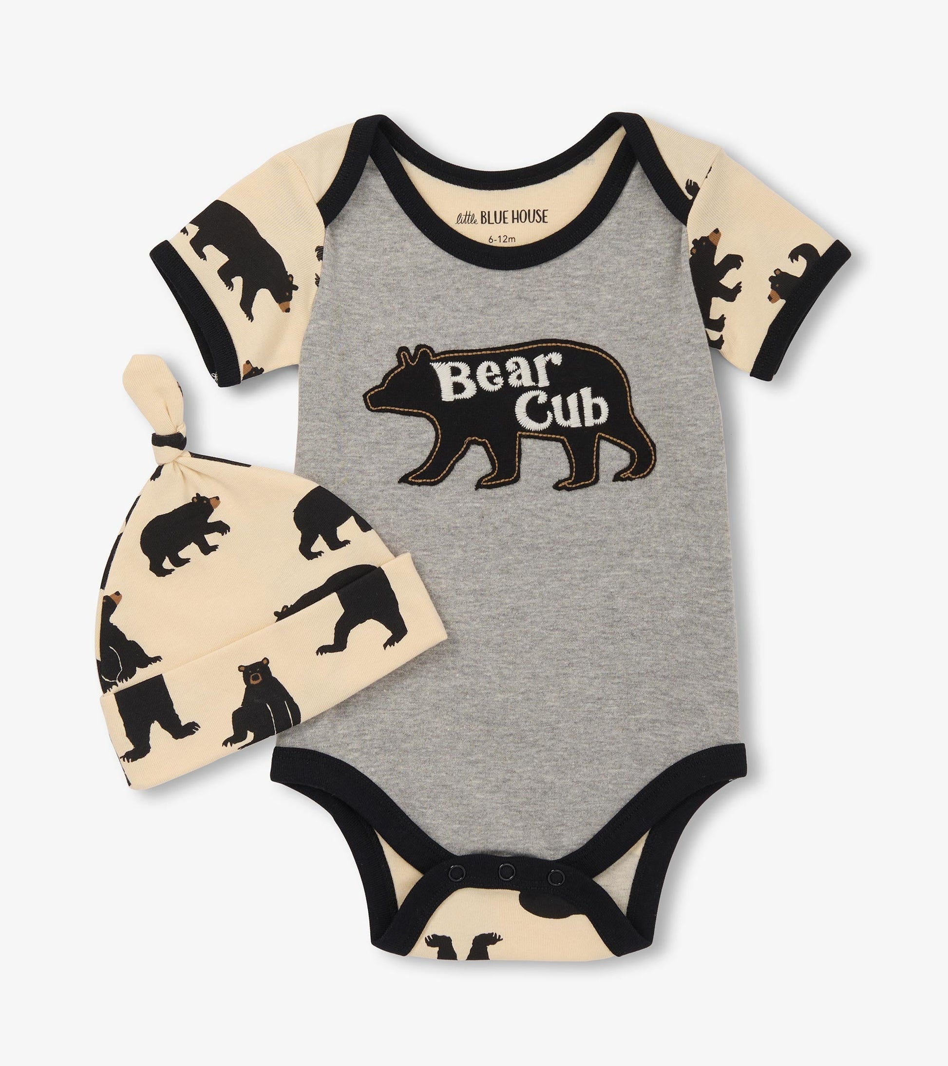 Grey bodysuit with bear graphic and black trim, paired with a matching beige hat featuring bear prints.