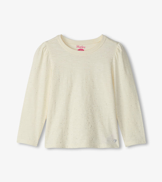 Cream long sleeve graphic tee with a subtle shimmer, featuring puffed sleeves and a round neckline.