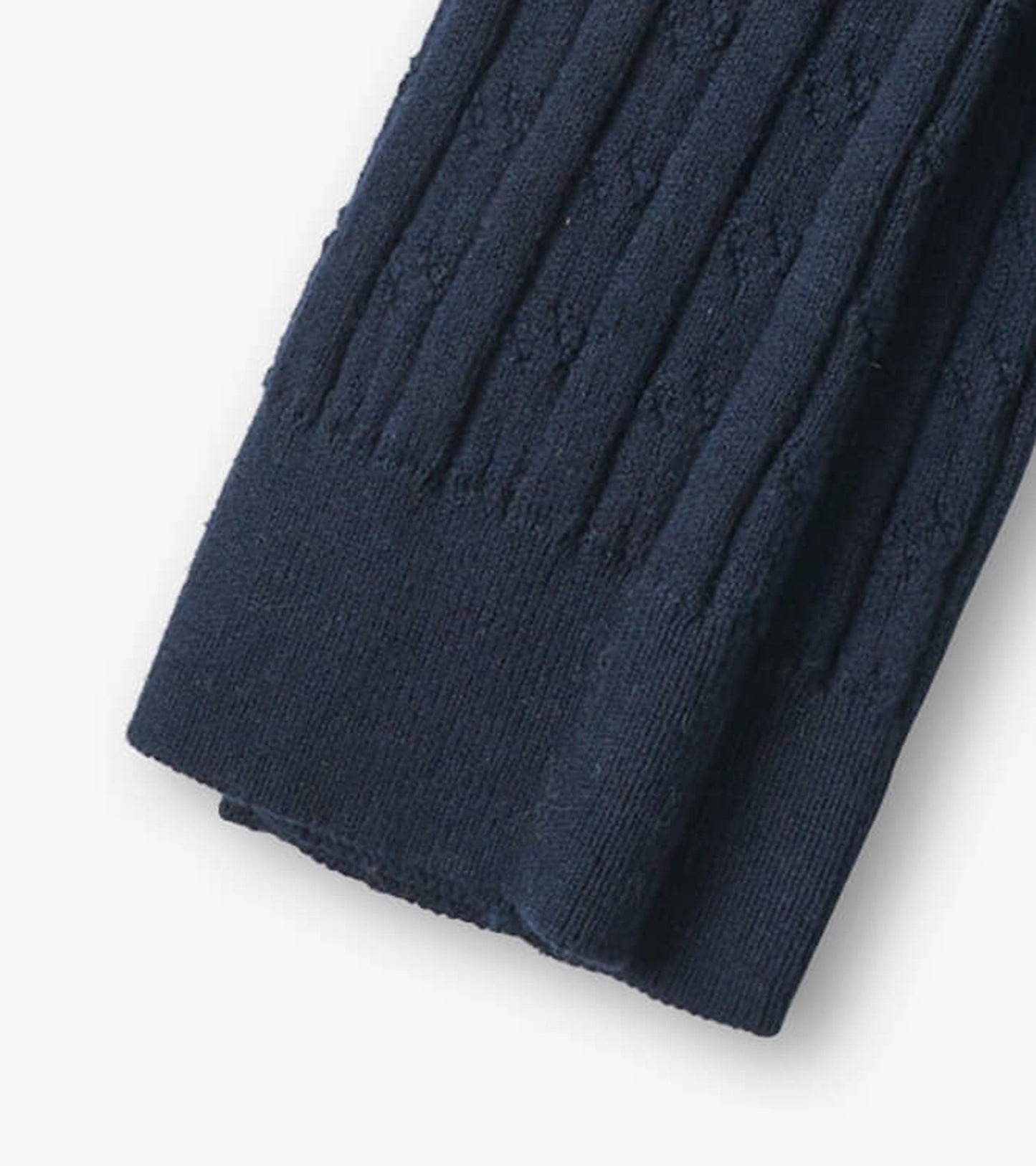 Navy cable knit tights with ribbed texture, suitable for girls, showcasing a soft and stretchy fabric.