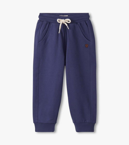 Patriot blue track pants for baby and toddler boys, featuring an elastic waistband and side pockets.