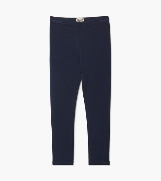 Navy blue cozy leggings made from soft material, featuring a fitted design suitable for girls.