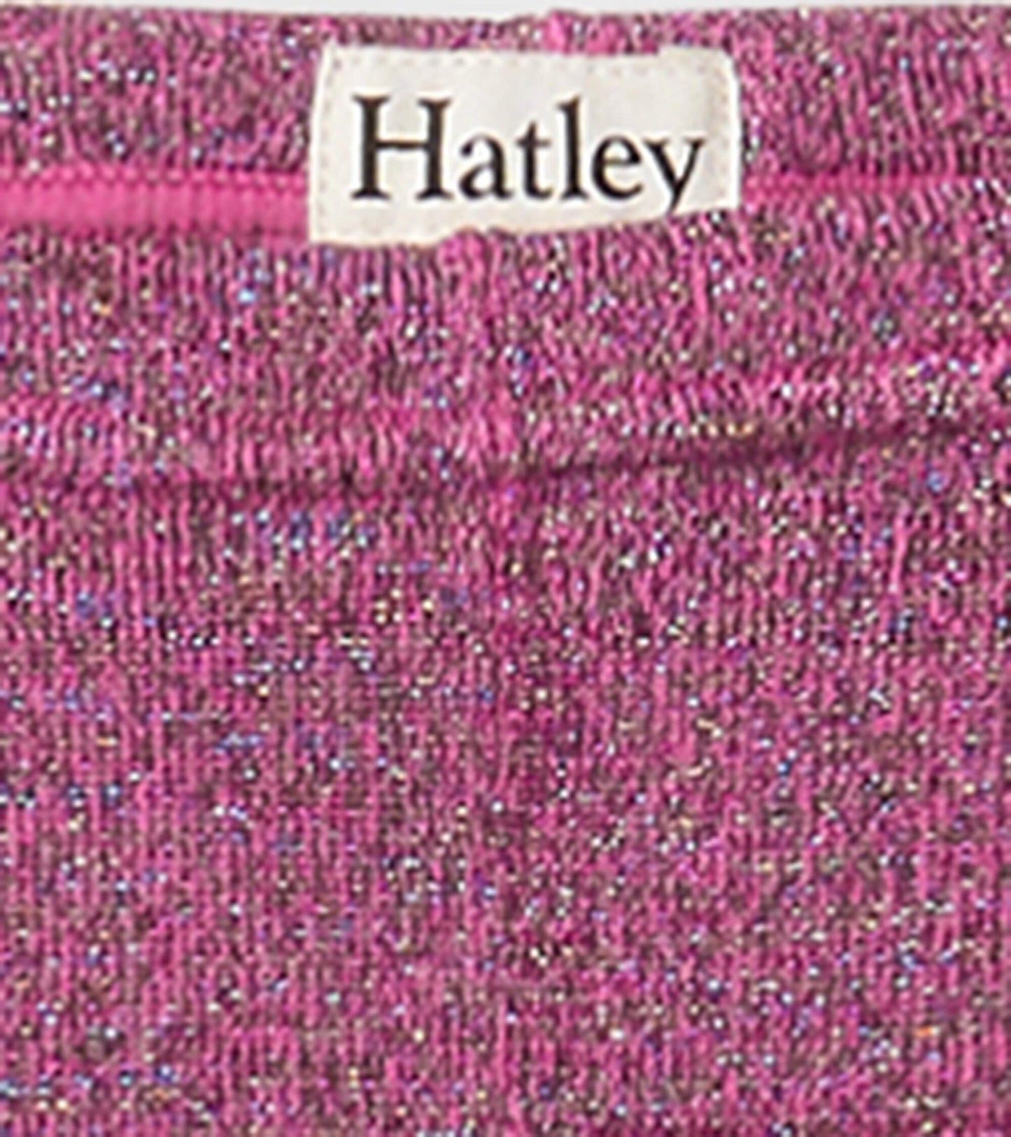 Pink glitter knit leggings with an elastic waistband, suitable for girls.