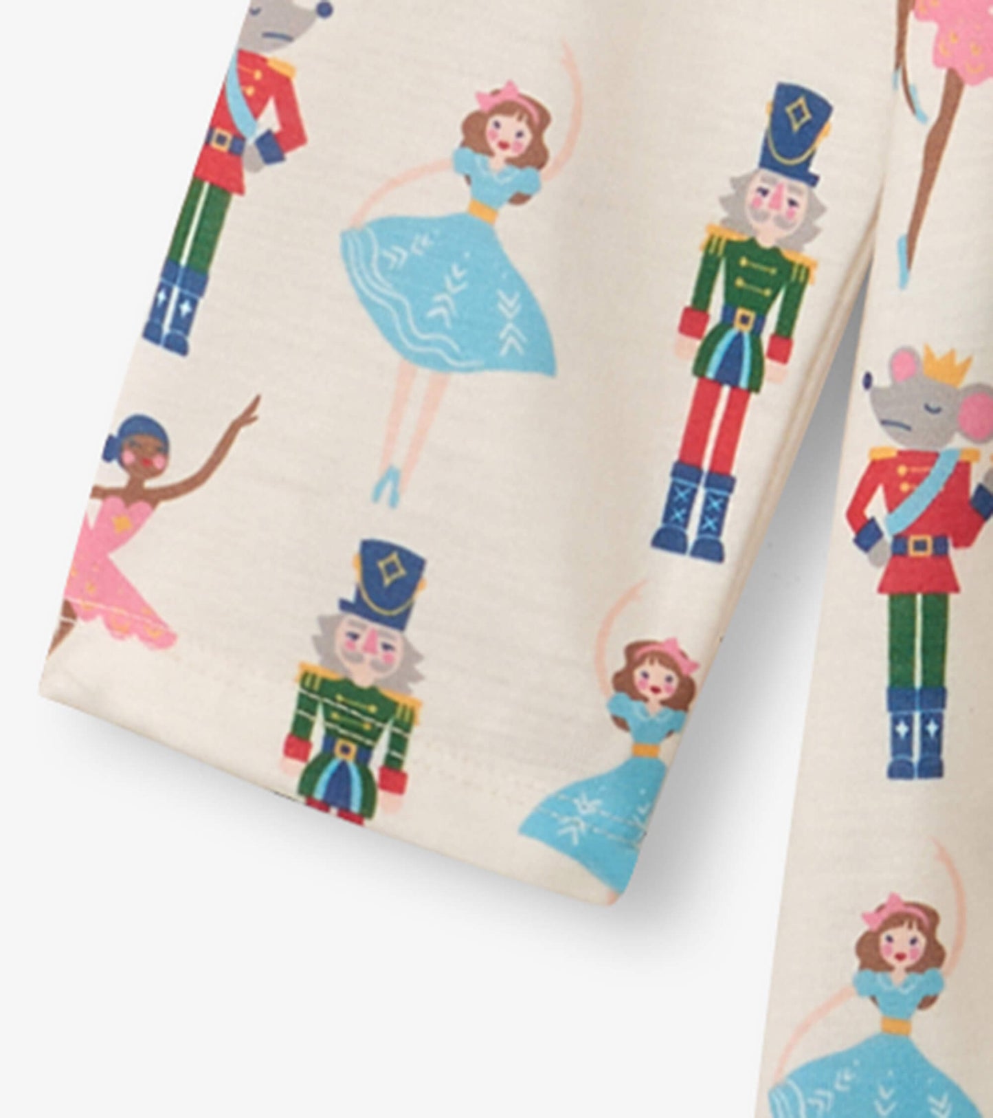 Cream long sleeve nightgown featuring colorful nutcracker and ballet dancer prints, perfect for cozy sleepwear.