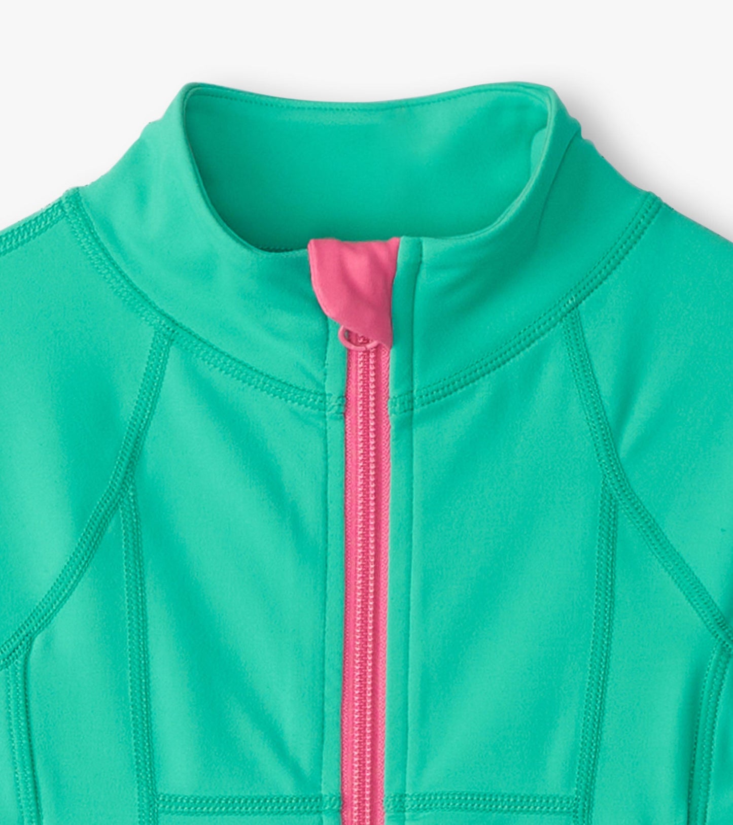 Aqua green active jacket with a pink zipper and high collar, featuring a smooth, stretchy fabric.