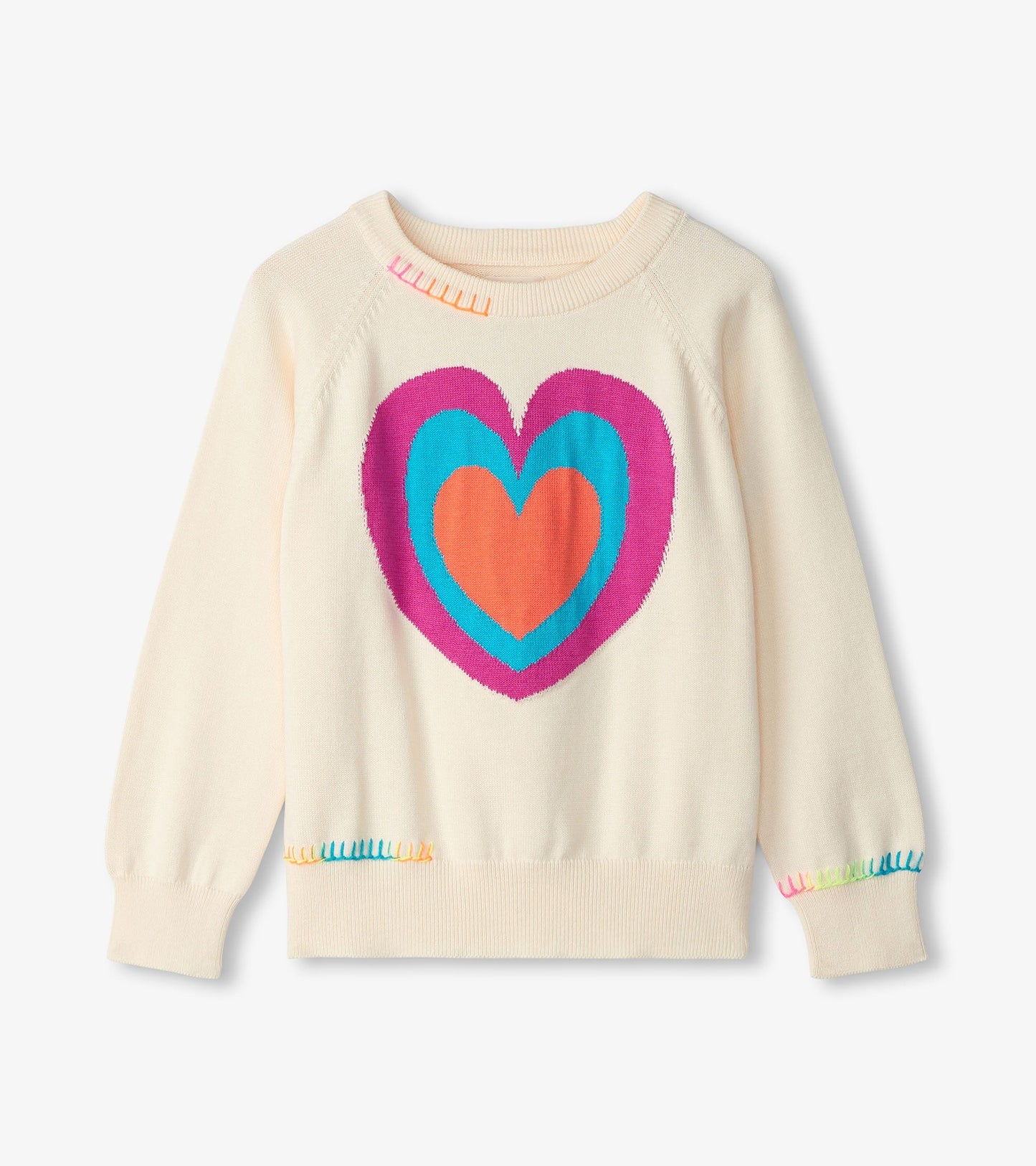 Cream sweater featuring a large, colorful heart design and playful trim at the hem and cuffs.