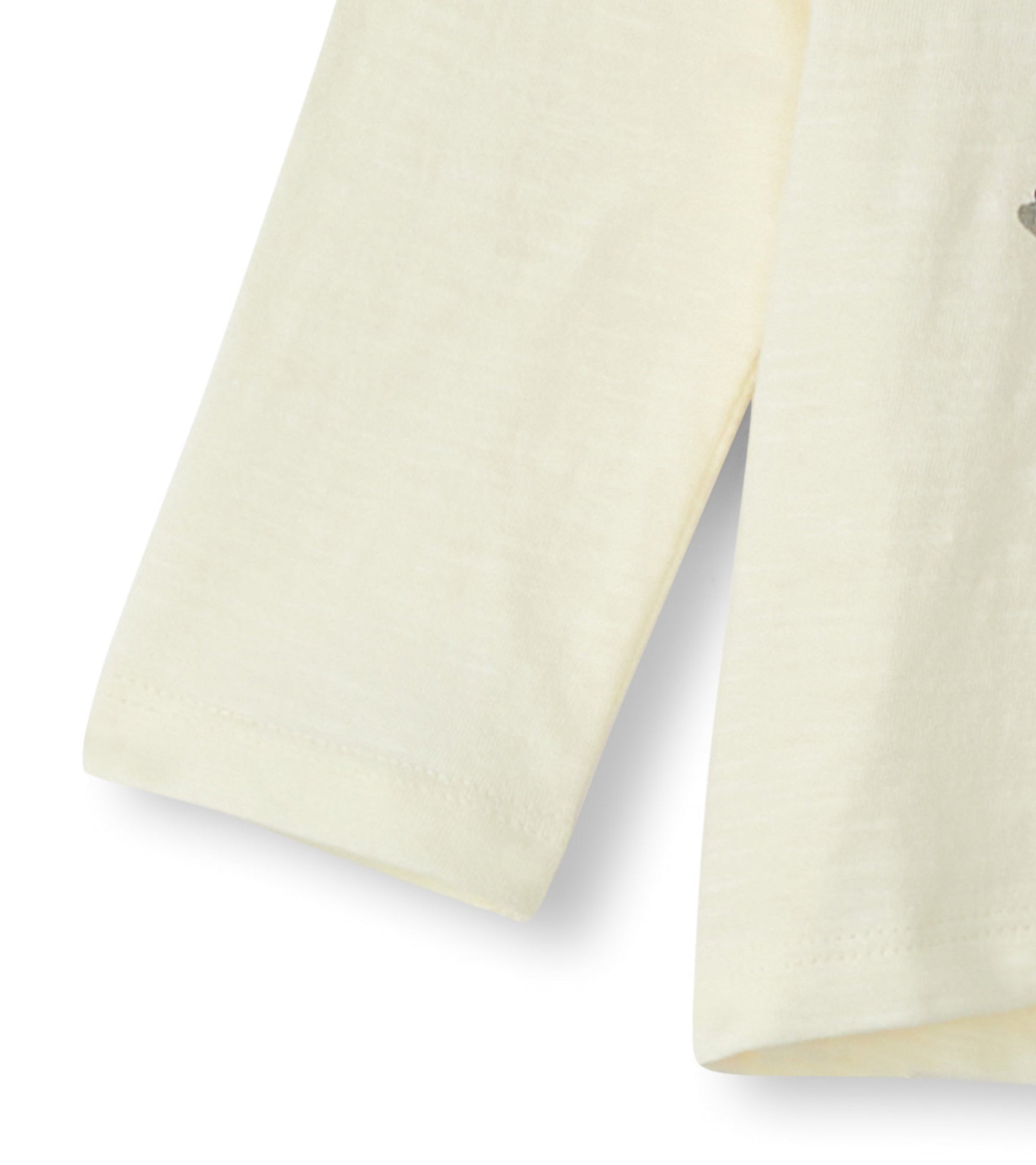 Cream long sleeve t-shirt featuring a playful skating deer design, suitable for babies and toddlers.
