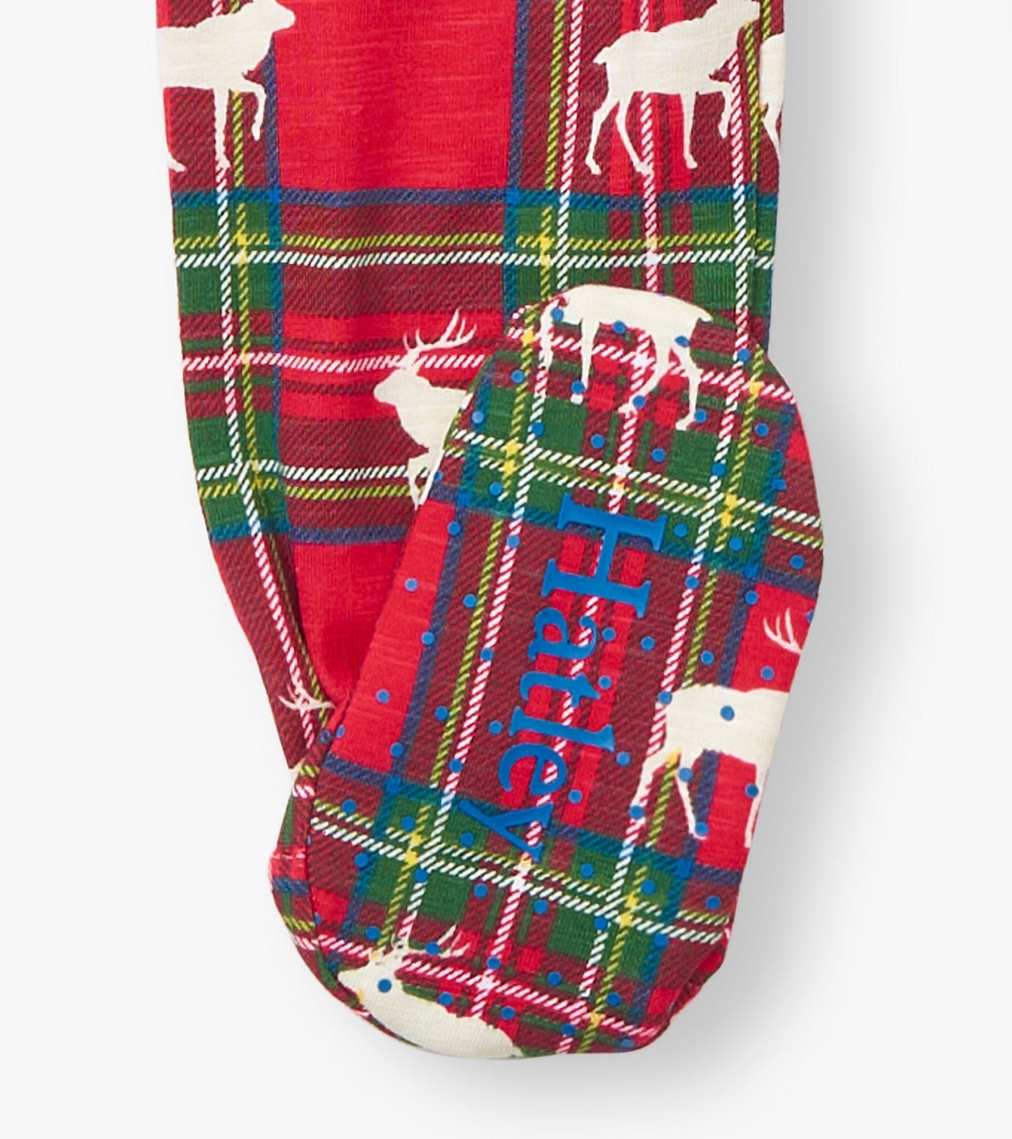 Red plaid cotton footed sleeper featuring white elk silhouettes and blue lettering on the foot. Available in multiple sizes.