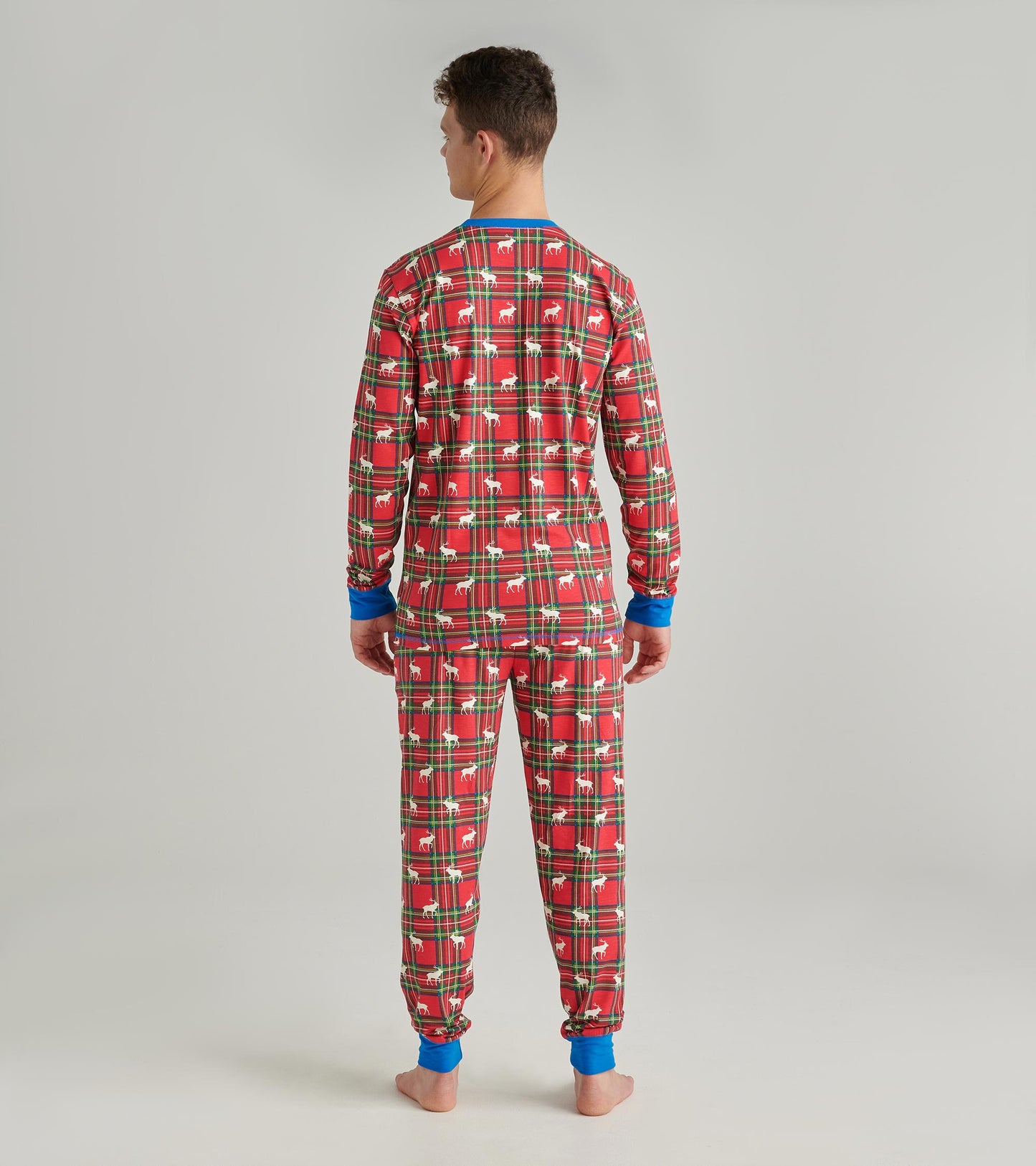Red plaid pajama set featuring moose patterns, with blue cuffs and collar, shown from the back.