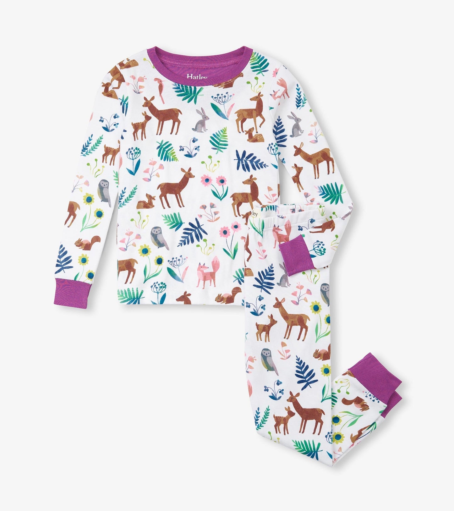 Organic cotton pajama set featuring colorful forest creatures and floral patterns, with purple cuffs and neckline.
