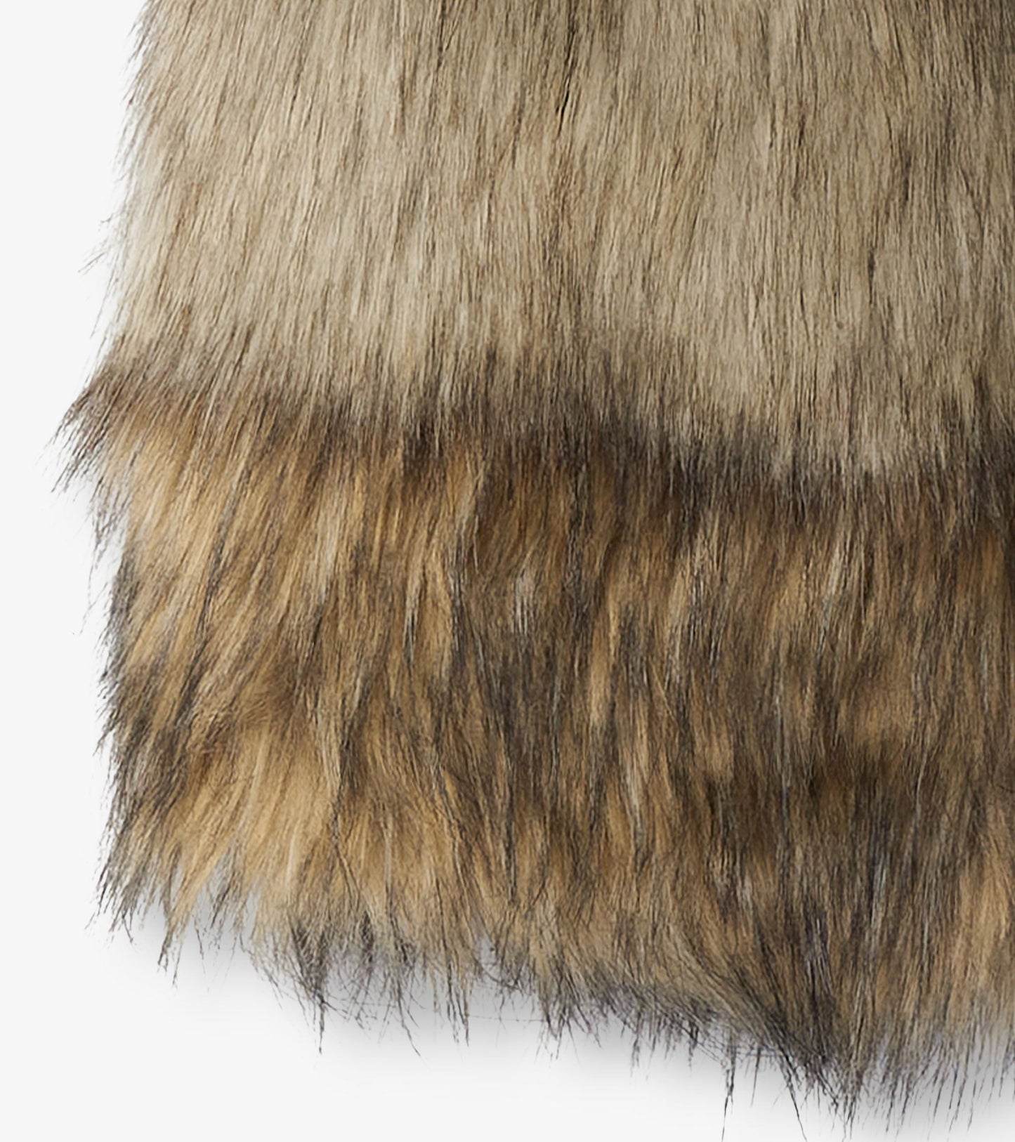 Faux fur vest in shades of brown and tan, featuring a soft, textured surface suitable for layering in cooler weather.