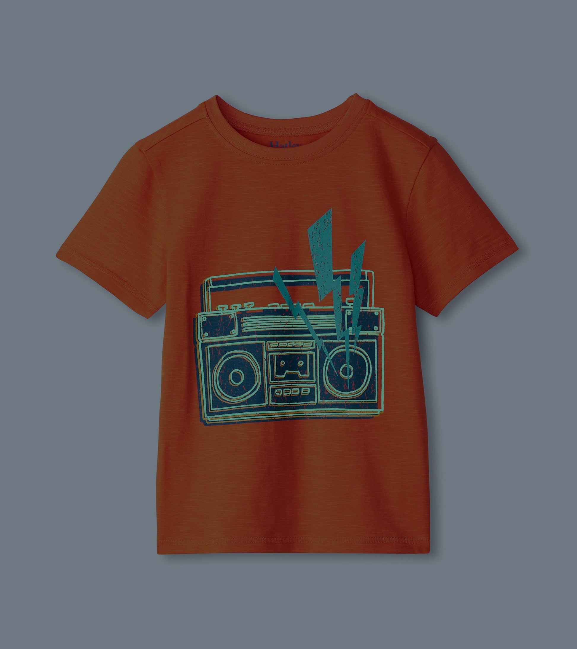 Orange short-sleeve tee featuring a glow-in-the-dark boombox graphic with blue accents.