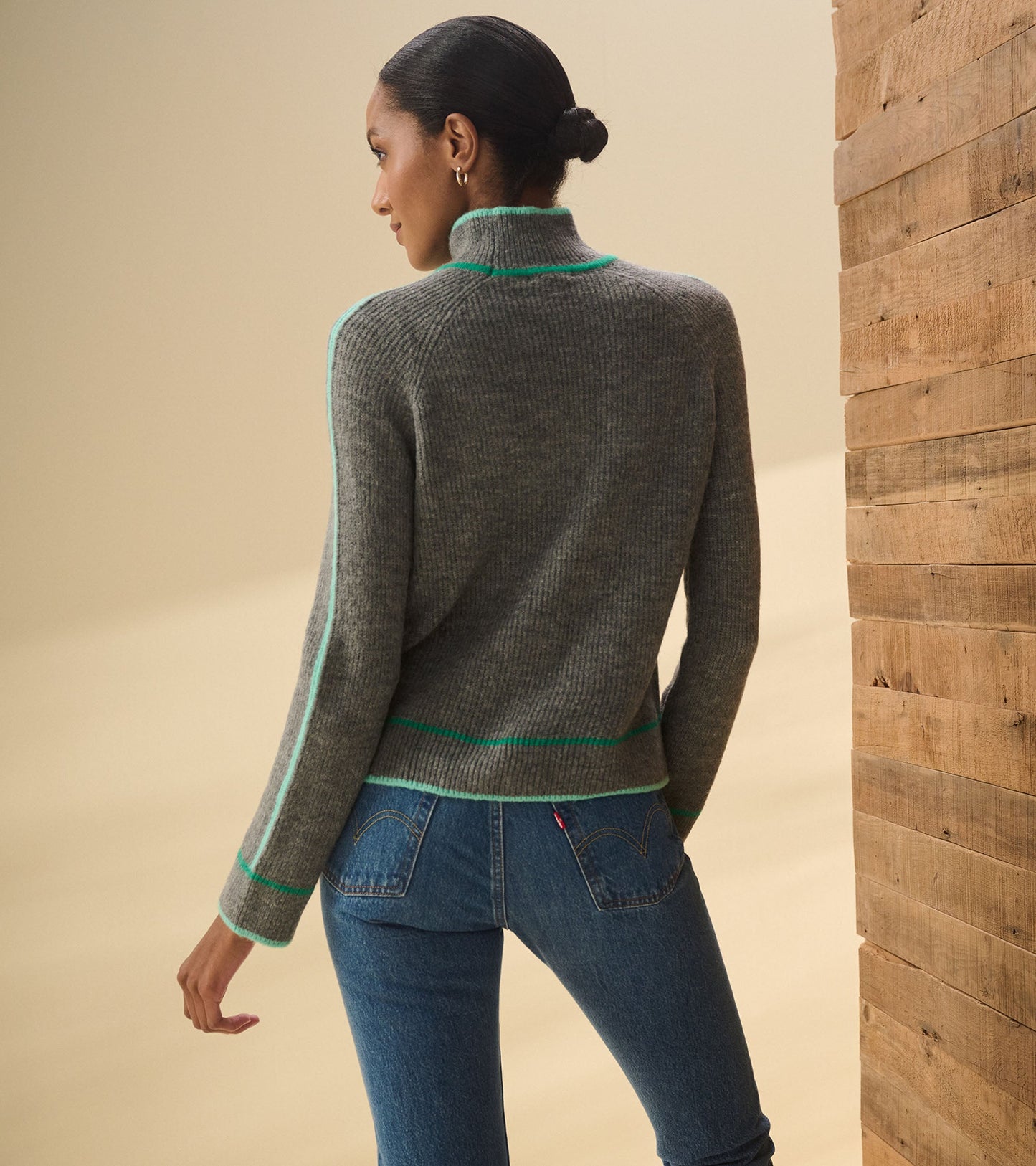 Charcoal heather pullover with a mock neck and contrasting green trim, shown from the back.