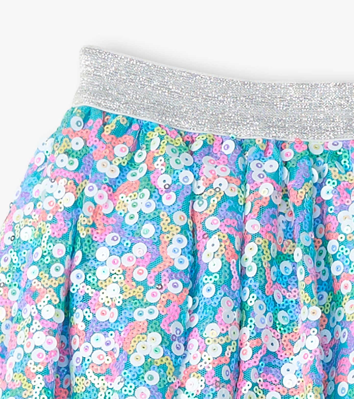 Colorful sequined tulle skirt with a silver elastic waistband, featuring a playful mix of pastel hues.