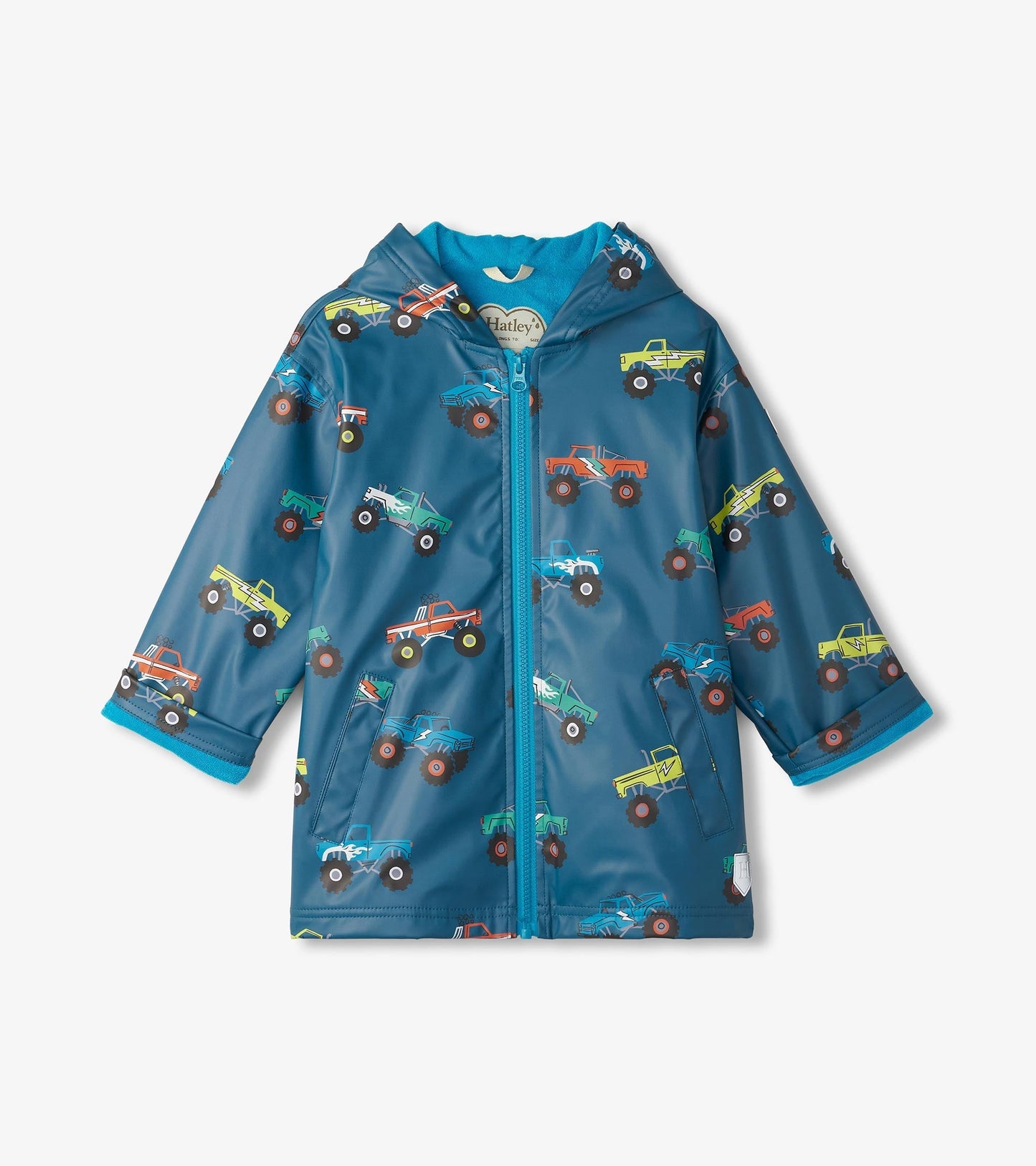 Blue zip-up rain jacket featuring colorful monster truck patterns, designed for boys with a hood and elastic cuffs.