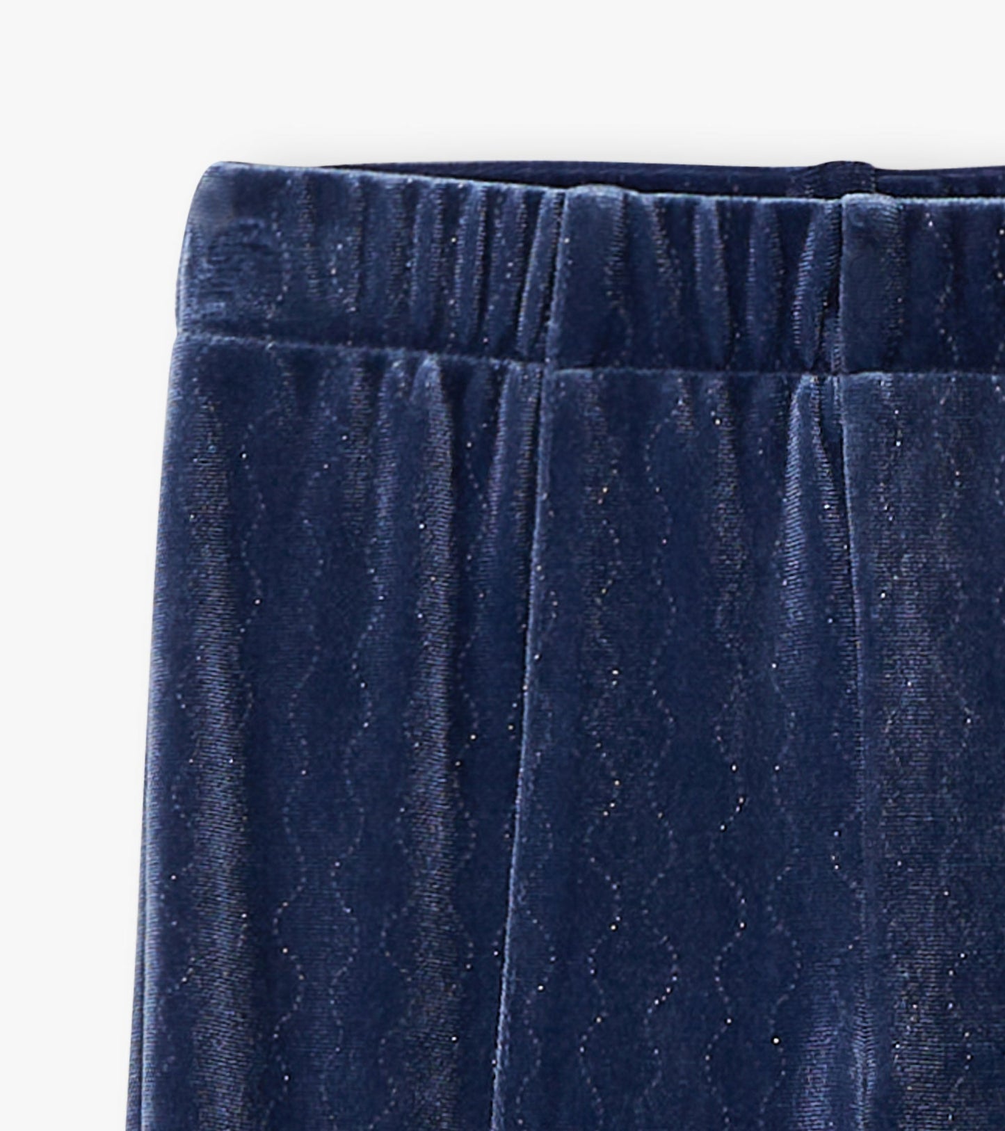 Navy stretchy flared pants with a wavy pattern and subtle sparkle, featuring an elastic waistband for comfort.