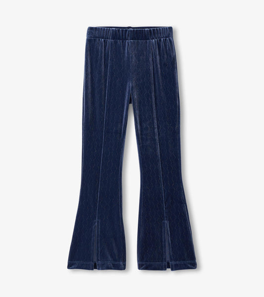 Navy stretchy flared pants with a sparkle wave pattern and an elastic waistband, suitable for girls.
