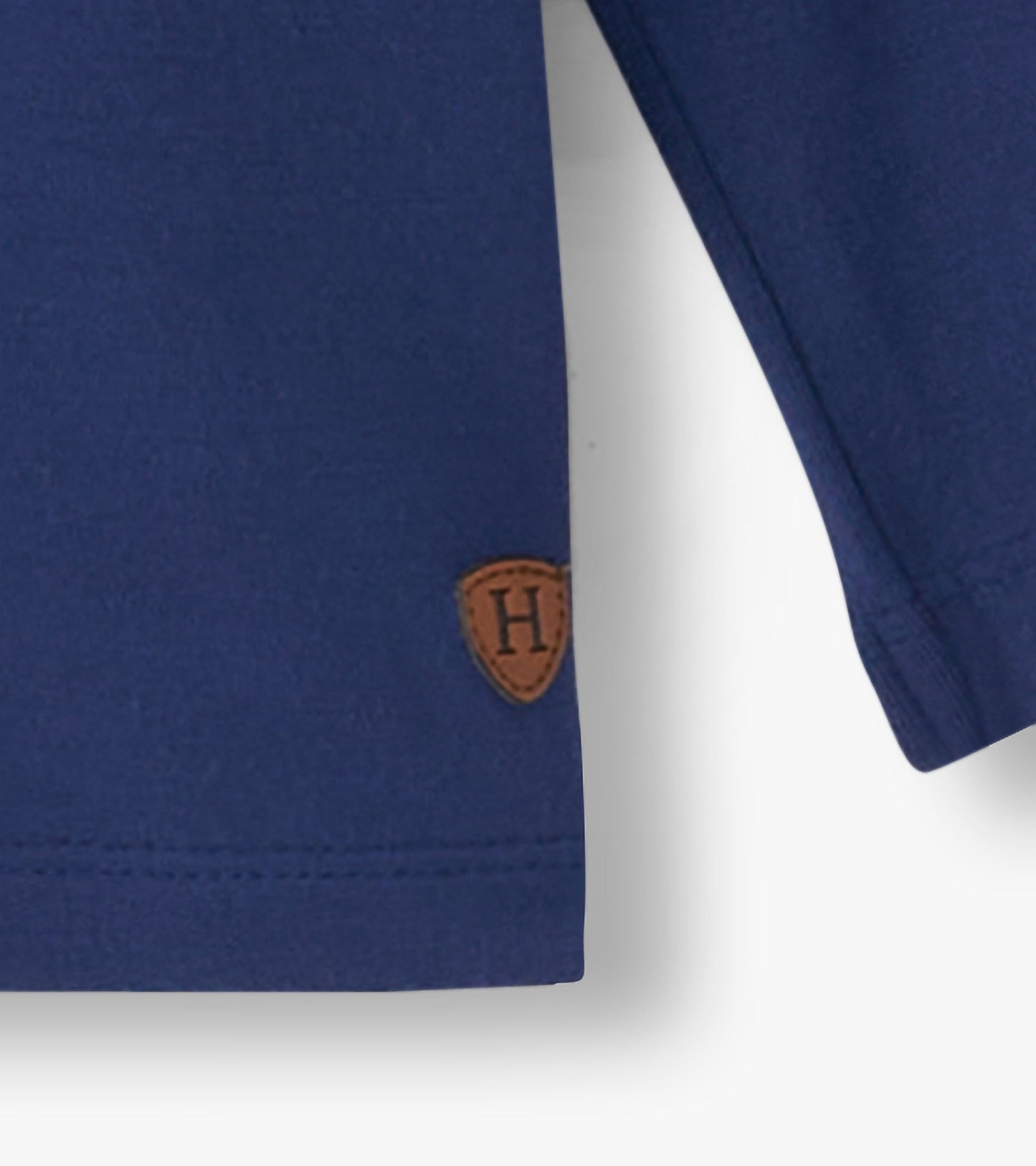 Patriot blue long sleeve t-shirt made of bamboo, featuring a small brown logo patch on the hem.