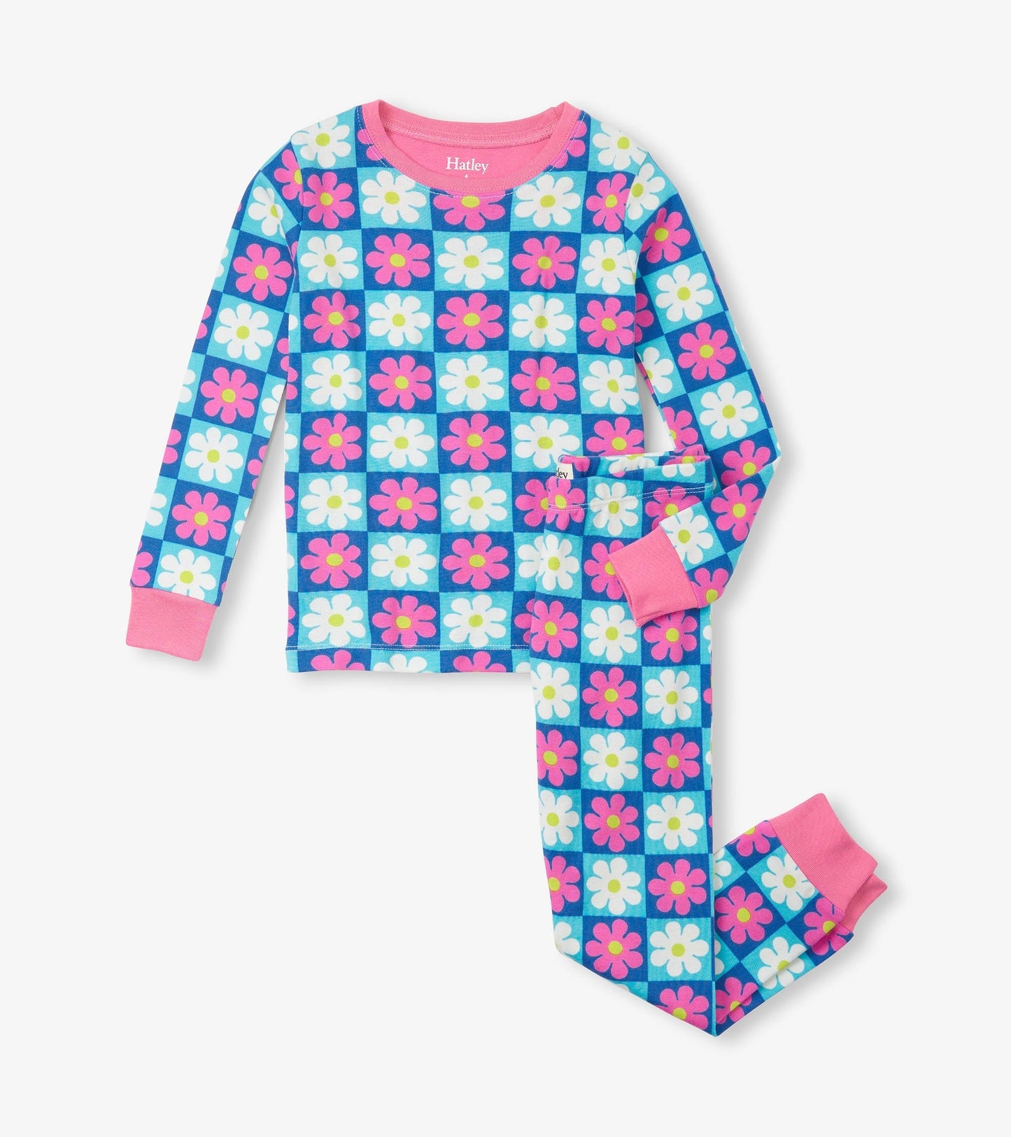 Blue checkered pajama set featuring colorful daisies, long sleeves, and pink cuffs, made from organic cotton.