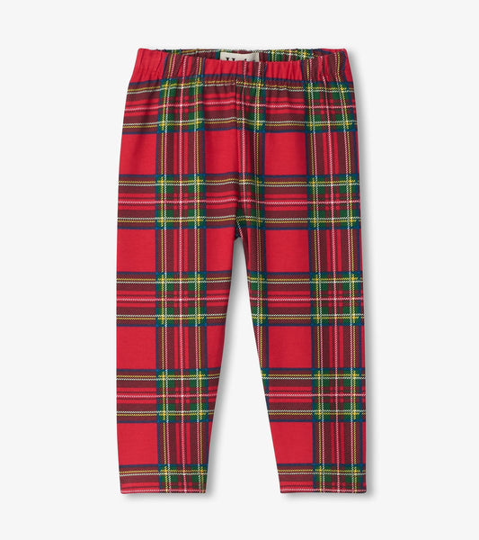 Red plaid leggings with an elastic waistband, suitable for babies and toddlers. Soft, stretchy fabric for comfort.