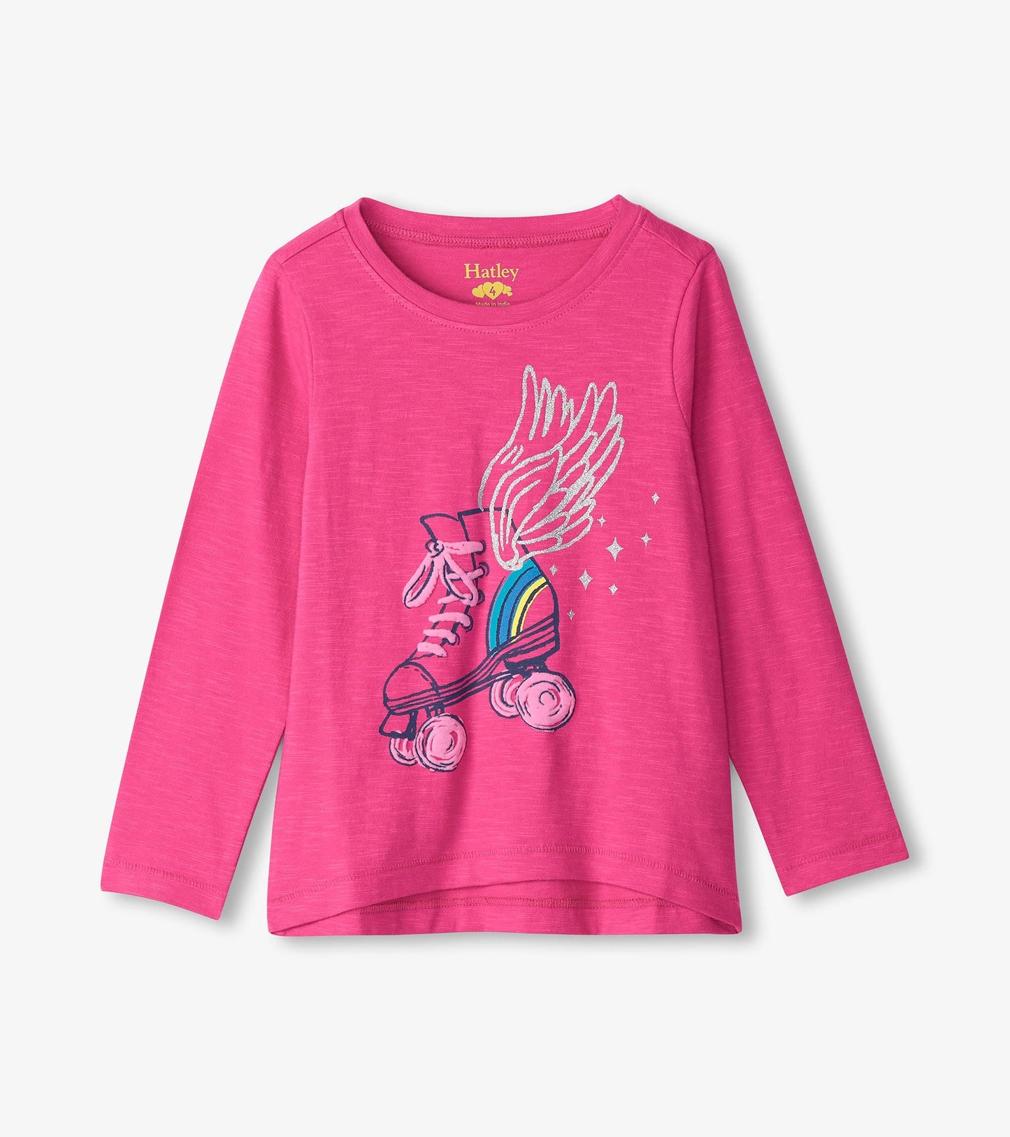 Pink long sleeve tee featuring a graphic of a roller skate with wings and stars.