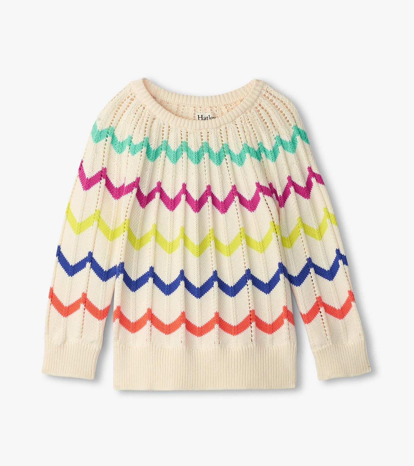 Cream sweater featuring colorful zigzag stripes in pink, green, blue, and orange, with a ribbed neckline and cuffs.