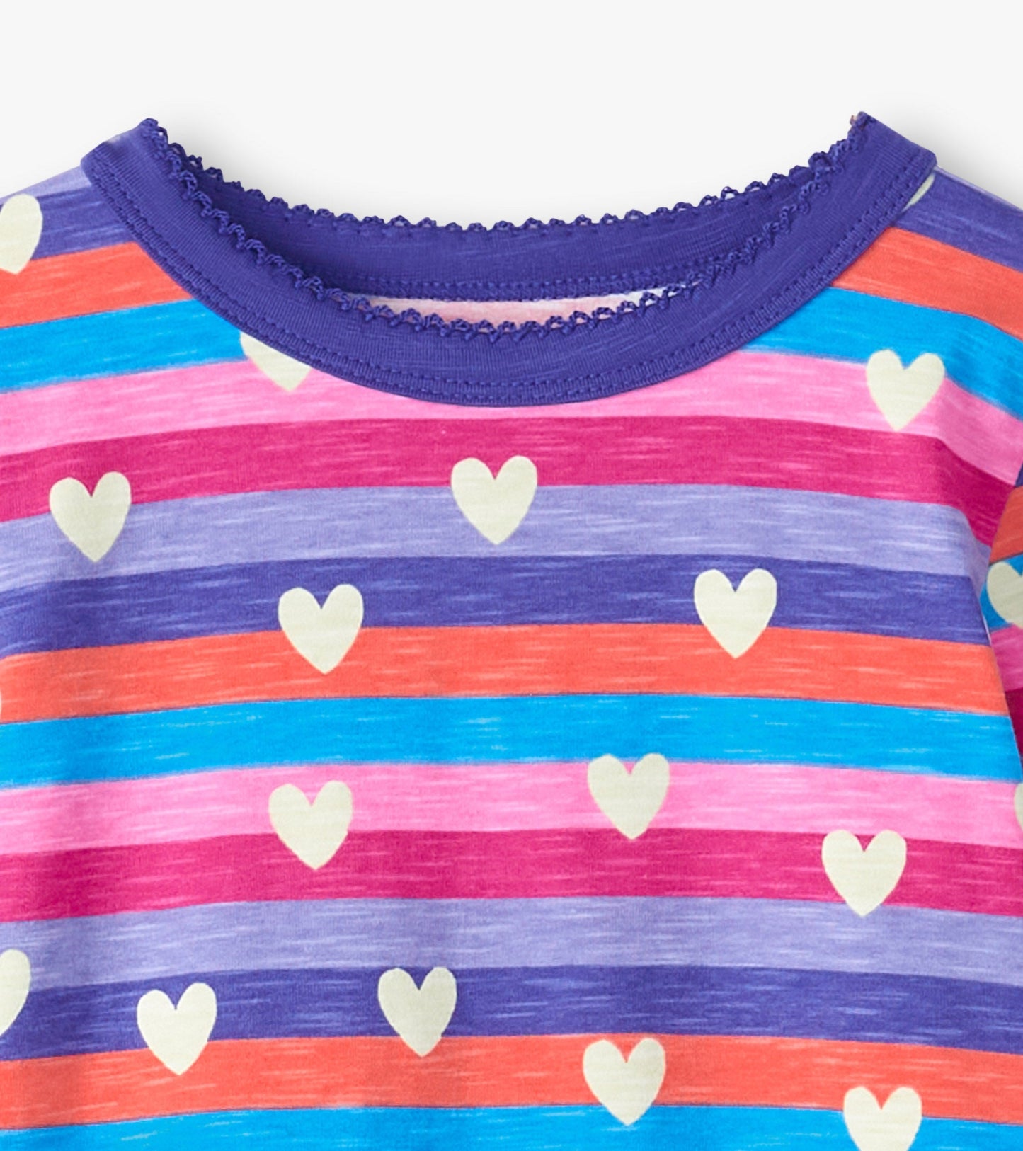 Colorful striped pajama top featuring hearts in shades of pink, purple, and blue with a purple scalloped neckline.