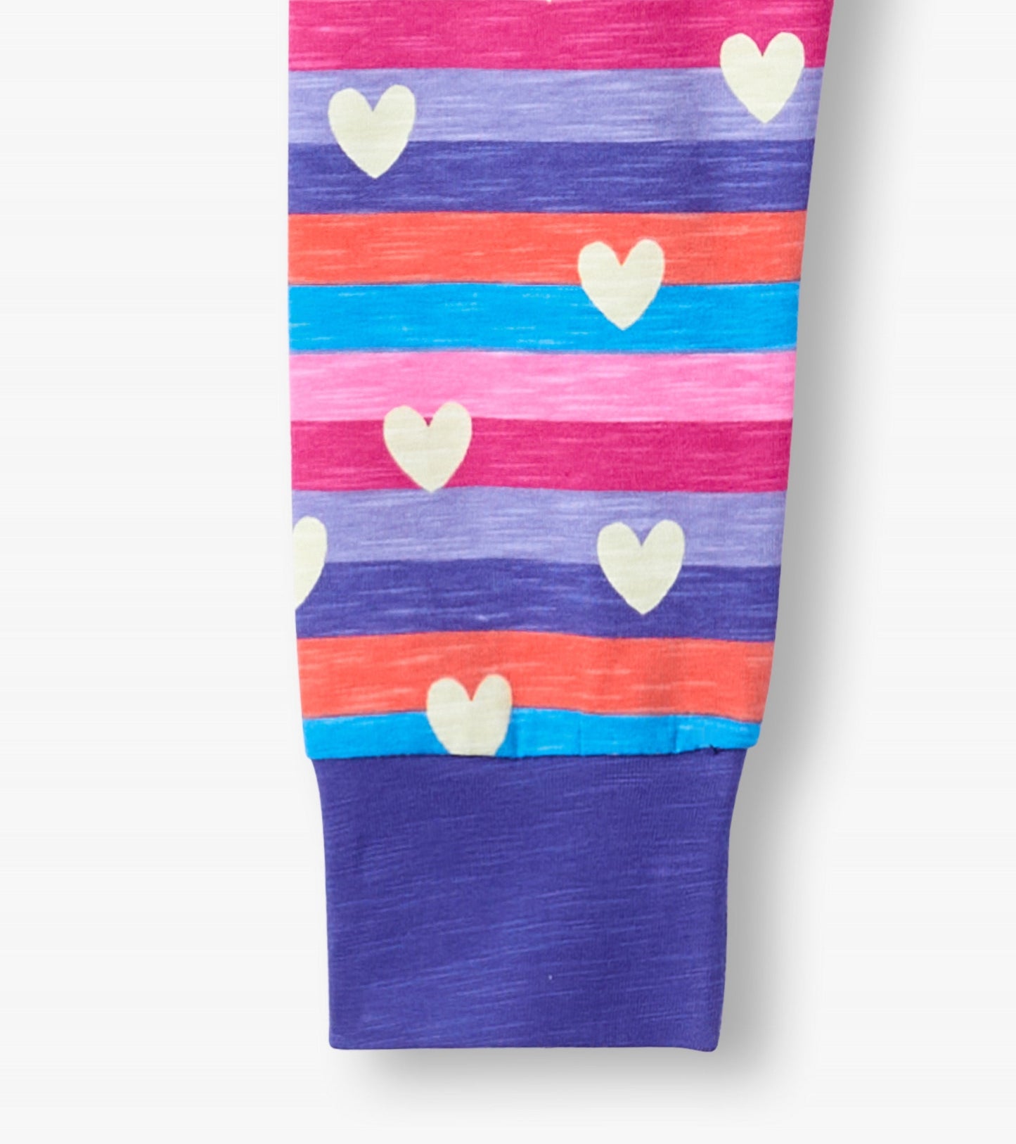 Colorful pajama set featuring stripes and hearts in pink, purple, blue, and orange with a purple cuff.