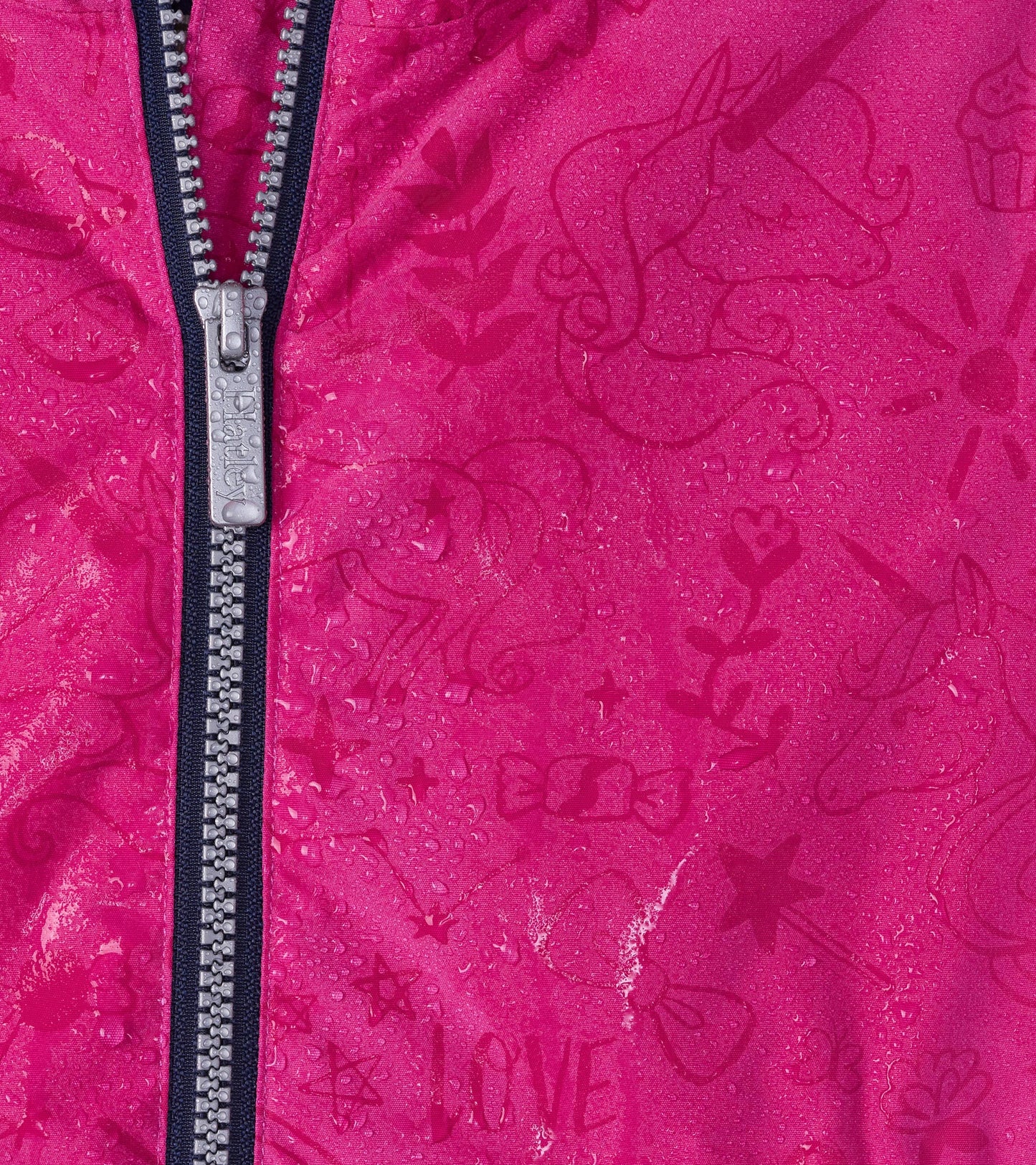 Lightweight pink rain jacket featuring a unicorn doodle pattern and a front zipper, suitable for girls.