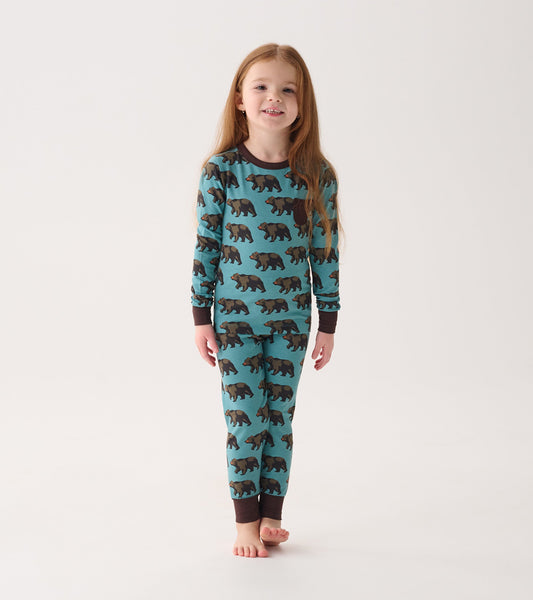 Boys' bamboo pajama set in teal with bear print, featuring long sleeves and pants with brown cuffs.