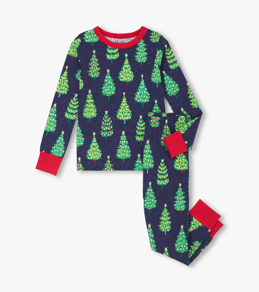 Navy cotton pajama set featuring colorful bottle brush trees and red cuffs, suitable for boys.