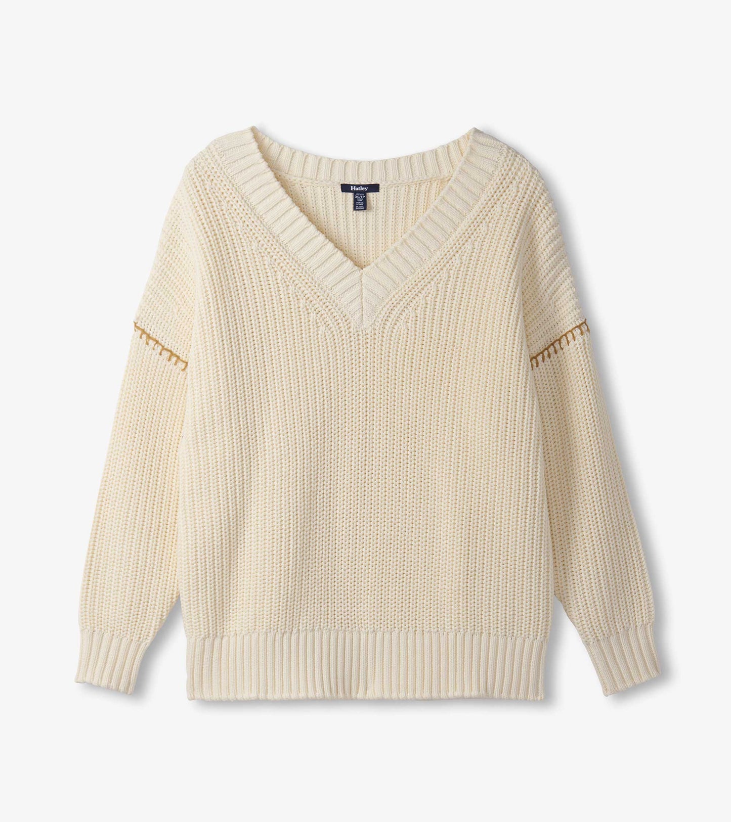 Cream V-neck slouchy sweater with a textured knit pattern and ribbed cuffs, perfect for casual wear.