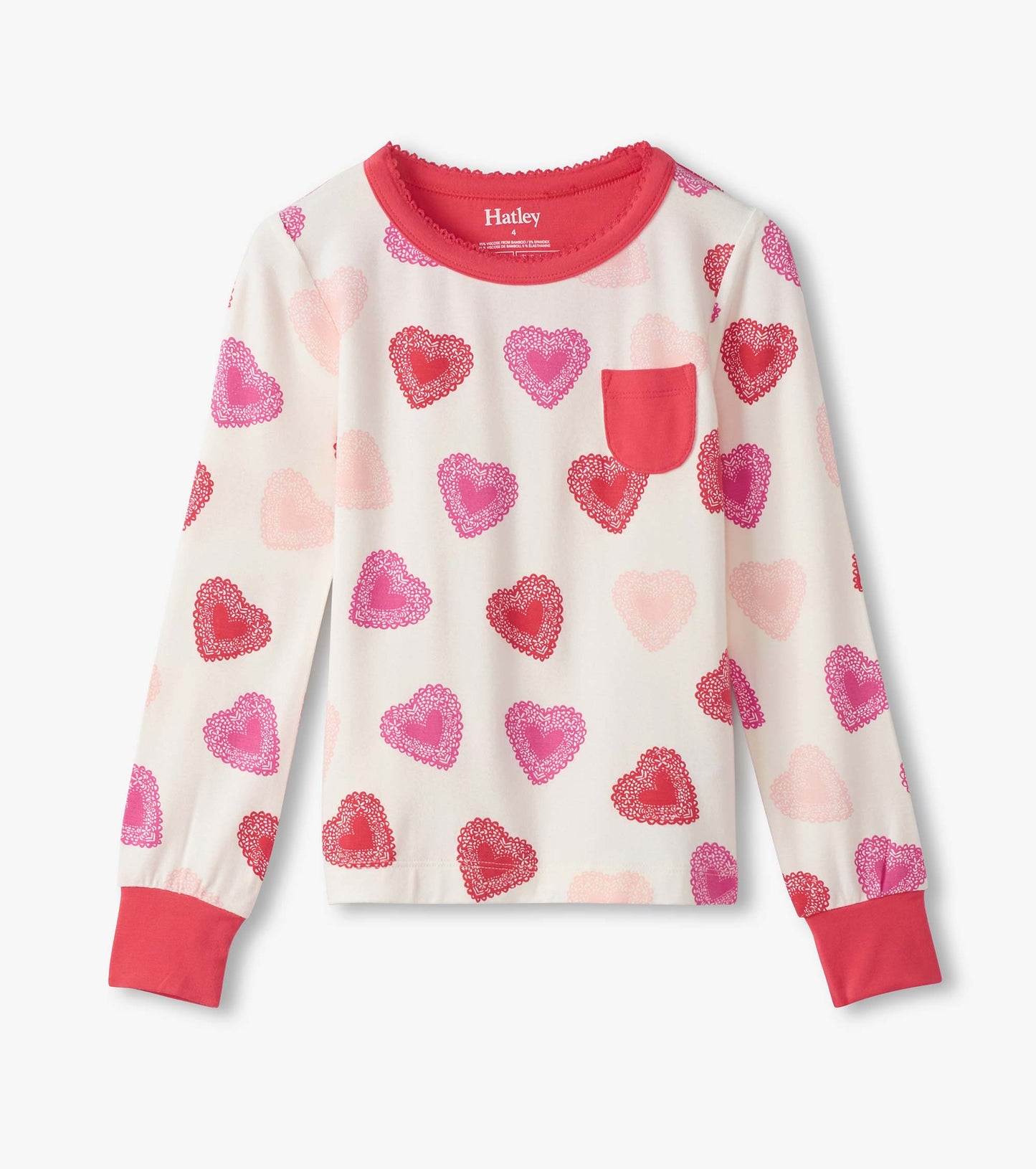 Long-sleeve pajama top in cream with colorful heart patterns and a red pocket, made from soft bamboo fabric.