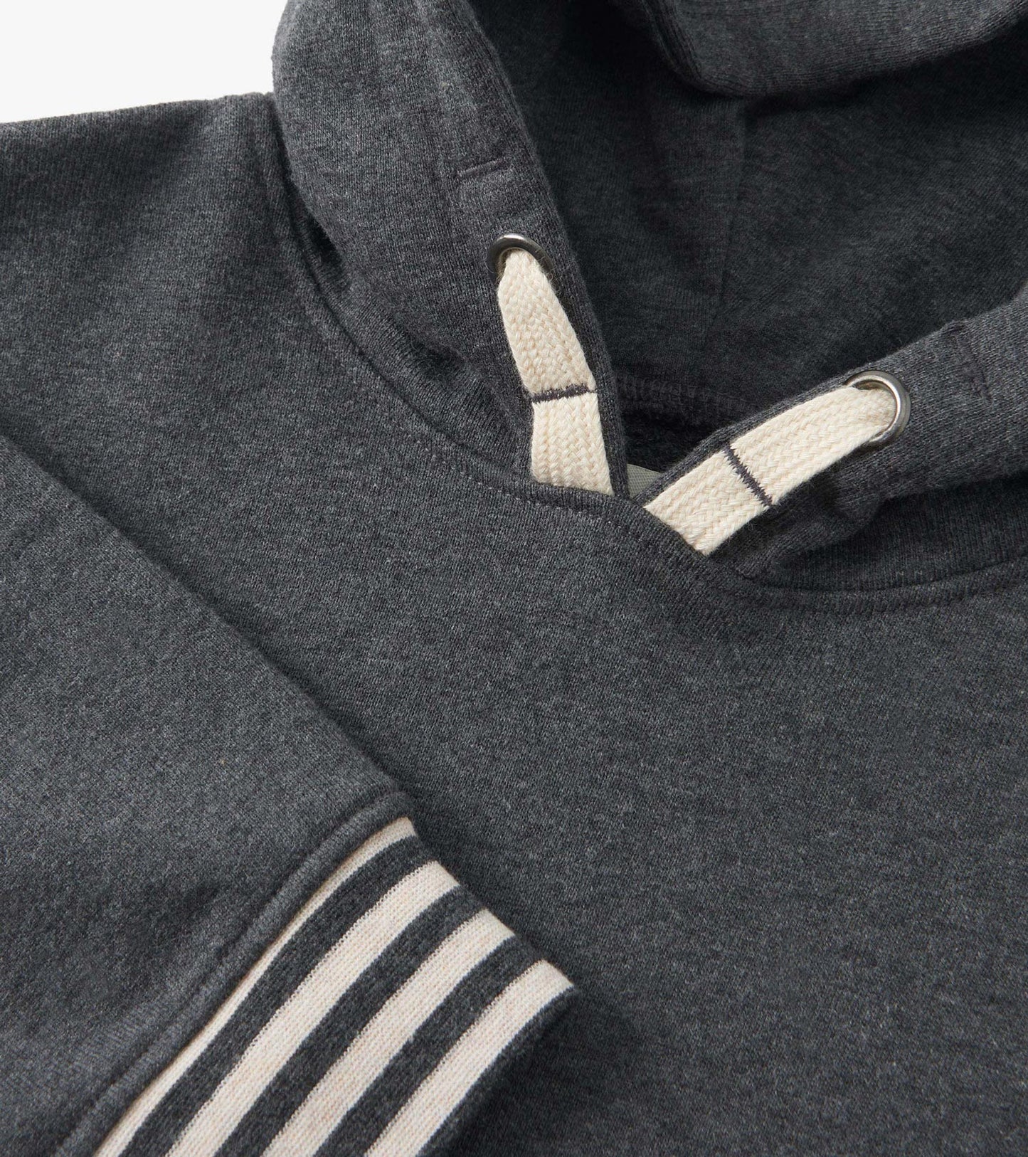 Charcoal melange pullover hoodie with a hood, cream drawstrings, and striped cuffs. Suitable for boys.