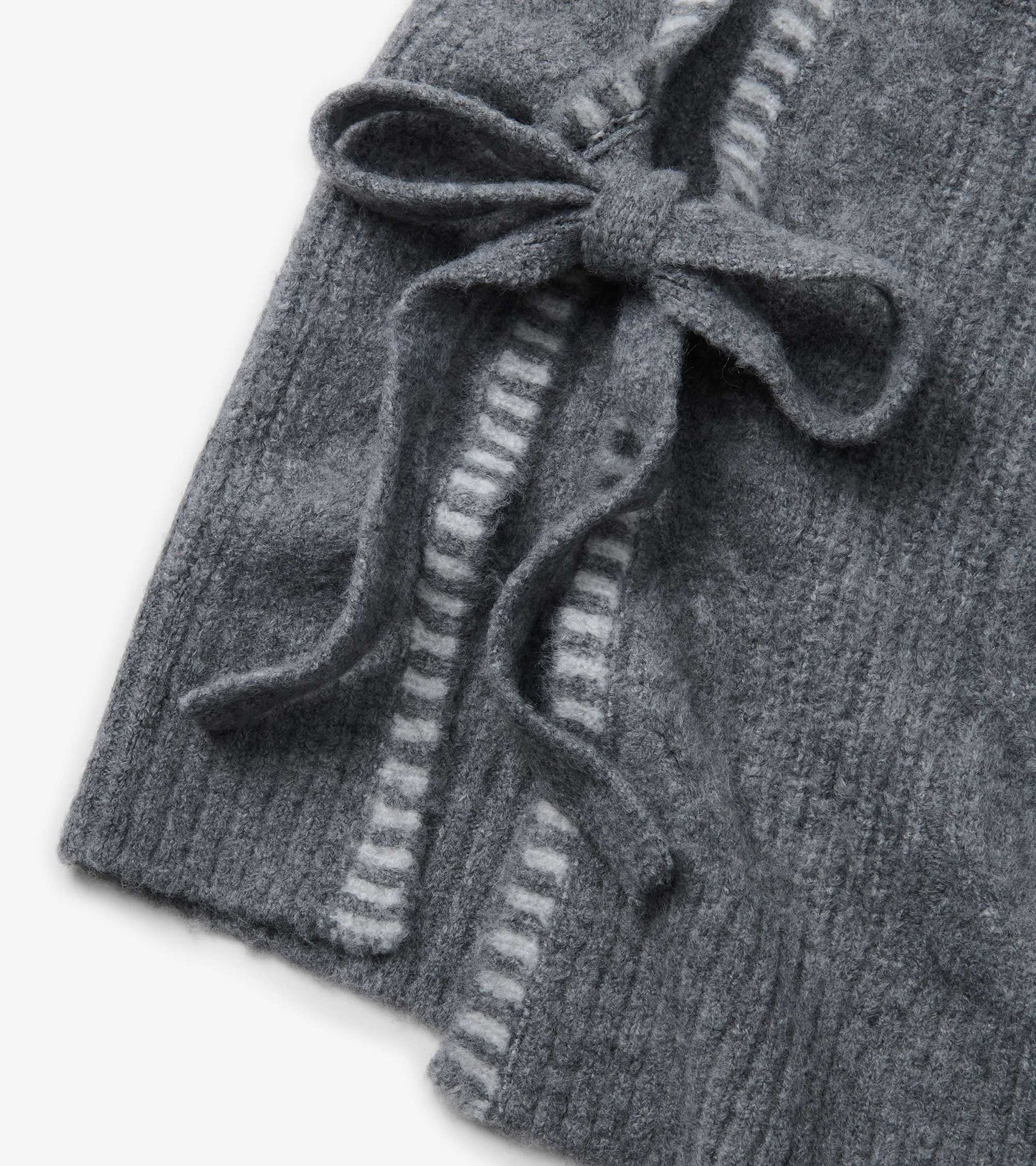 Charcoal melange knit sweater vest with side tie closure and striped trim detail, close-up view