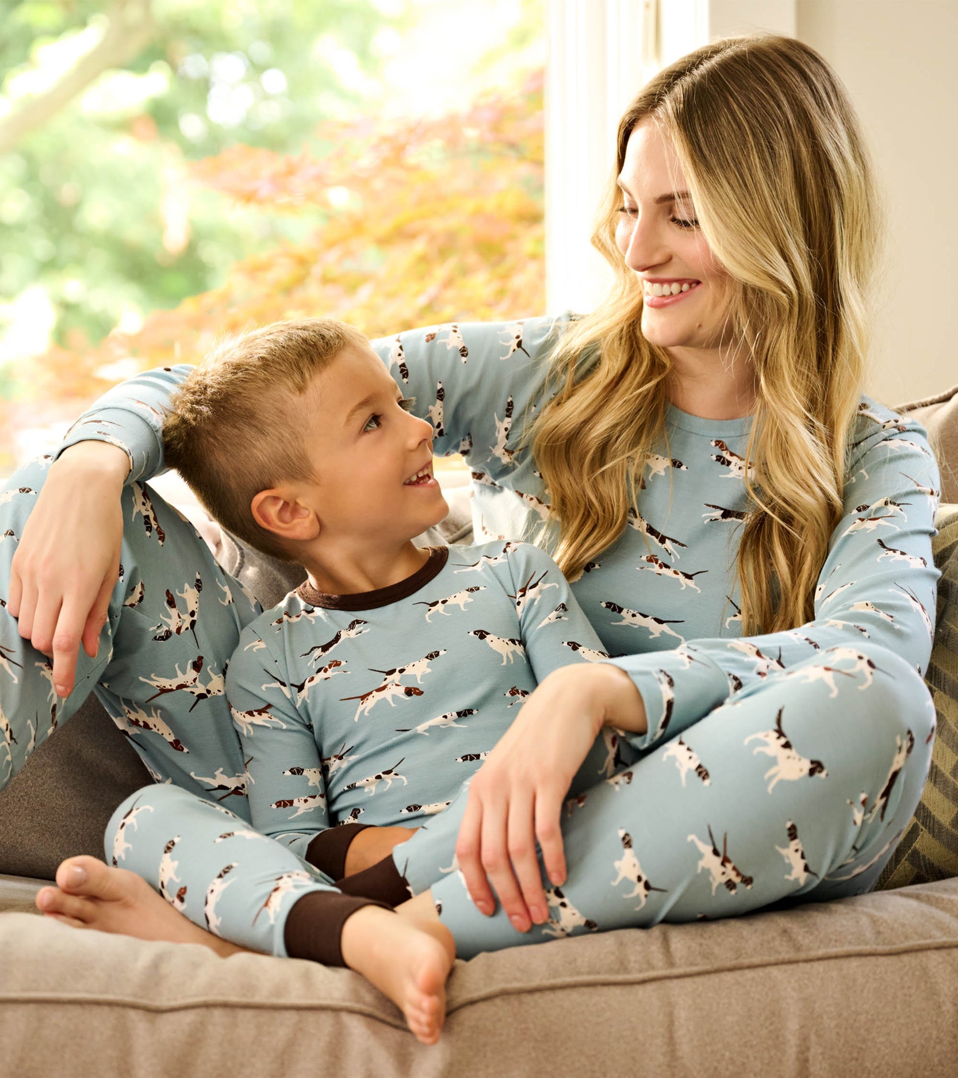 Light blue bamboo pajama set featuring hunting dog patterns, suitable for boys, with long sleeves and a comfortable fit.