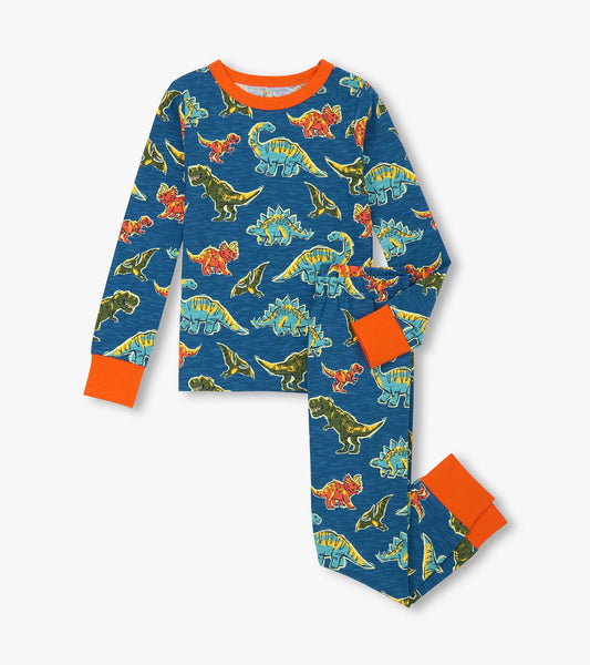 Blue cotton pajama set featuring colorful dinosaur prints, with orange cuffs and neckline. Suitable for boys.