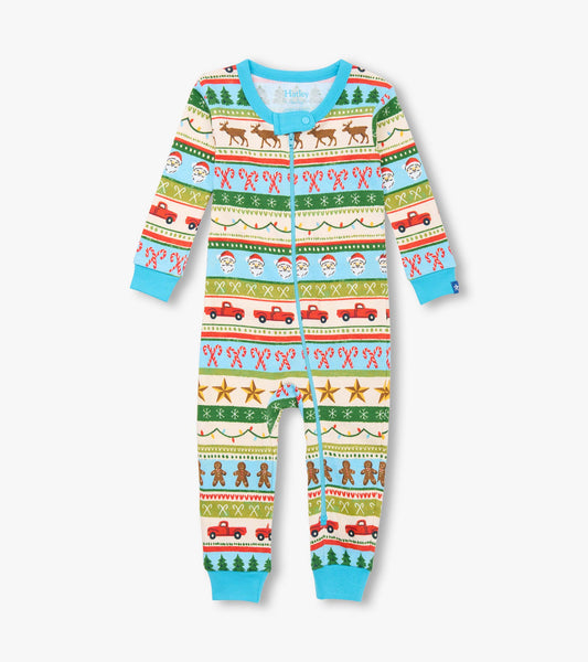 Blue cotton sleeper featuring a festive Fair Isle pattern with reindeer, trees, and trucks, designed for baby boys.