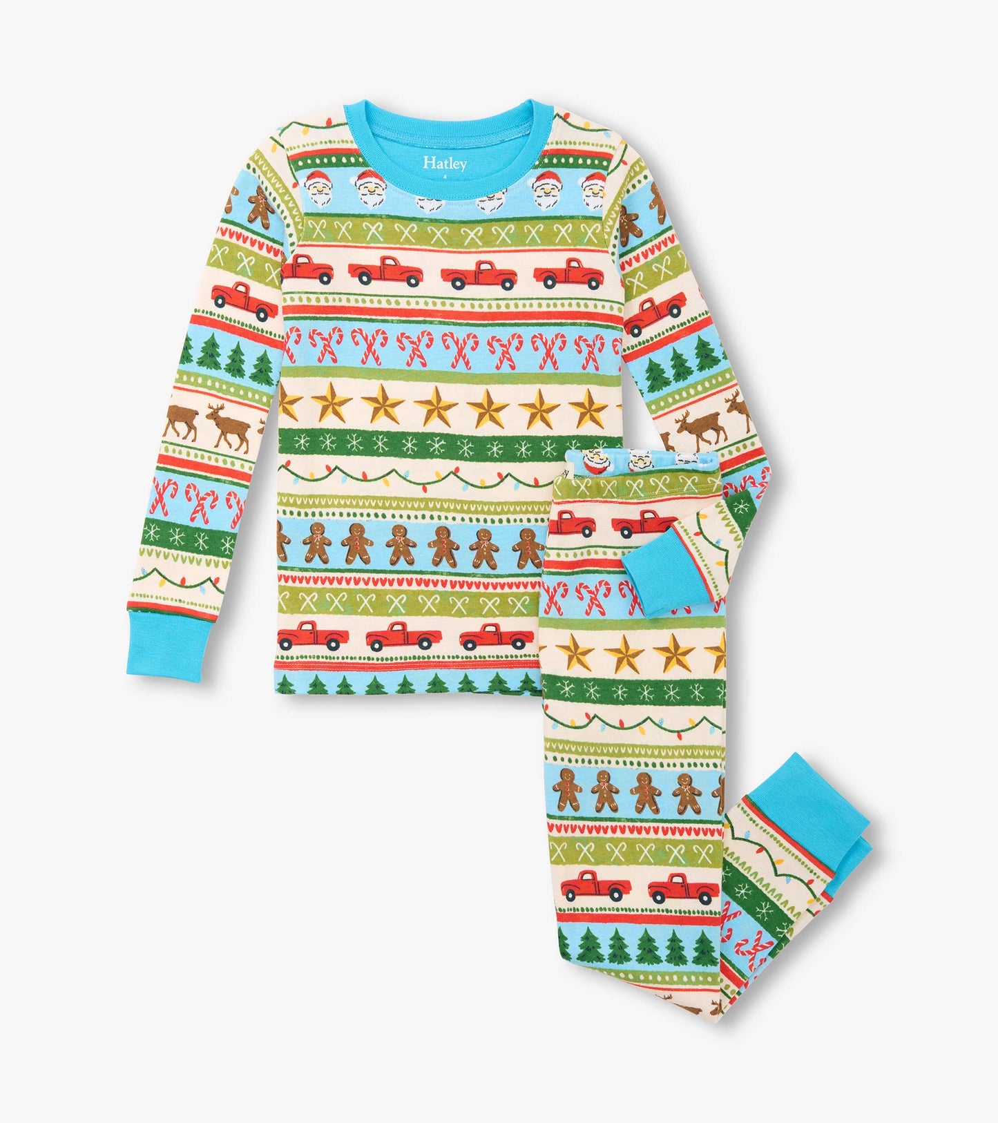 Boys' blue cotton pajama set featuring a festive Fair Isle pattern with Santa, trees, and gingerbread men.