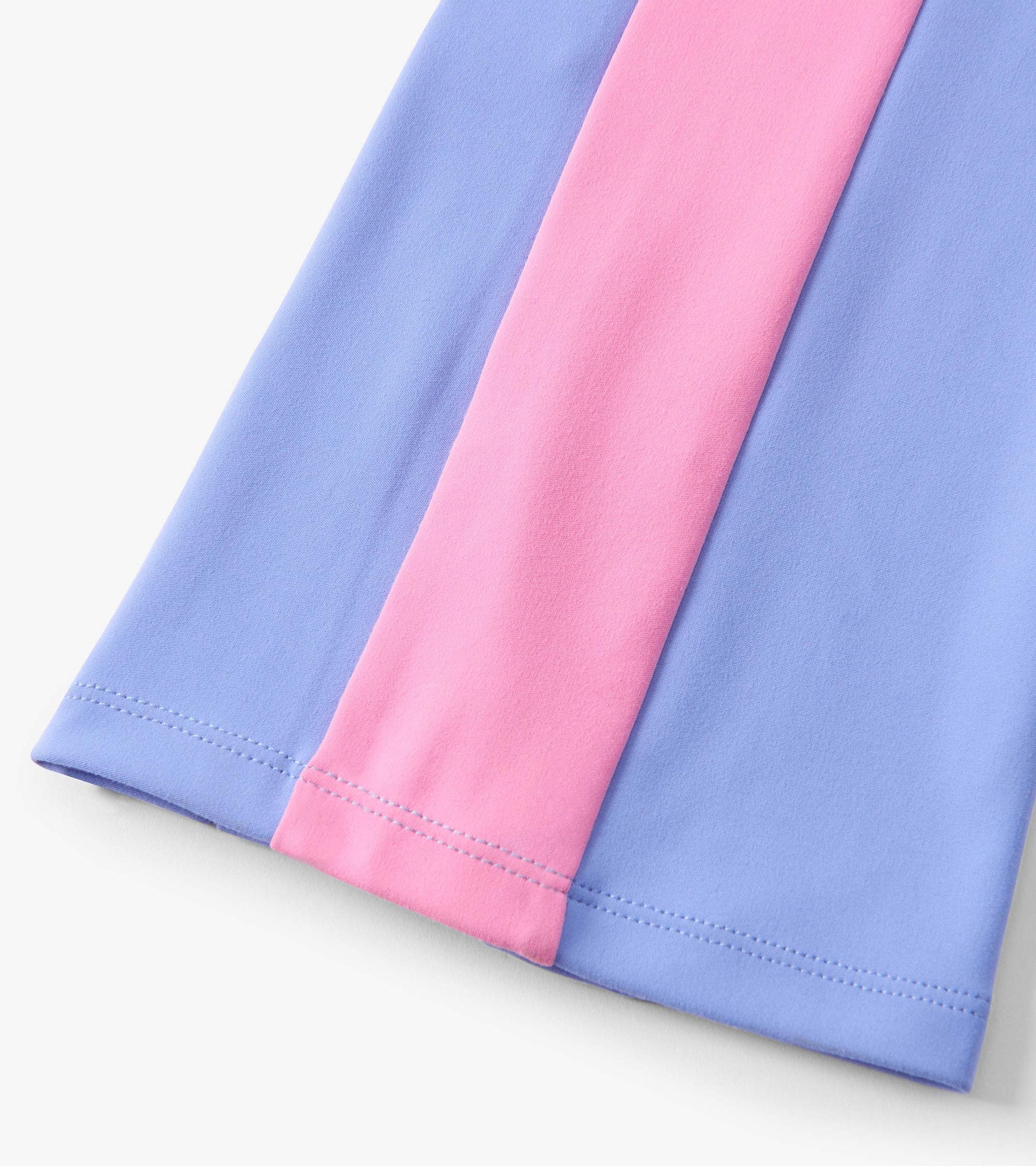 Purple active flared pants with a pink stripe, made from soft material, suitable for active wear.