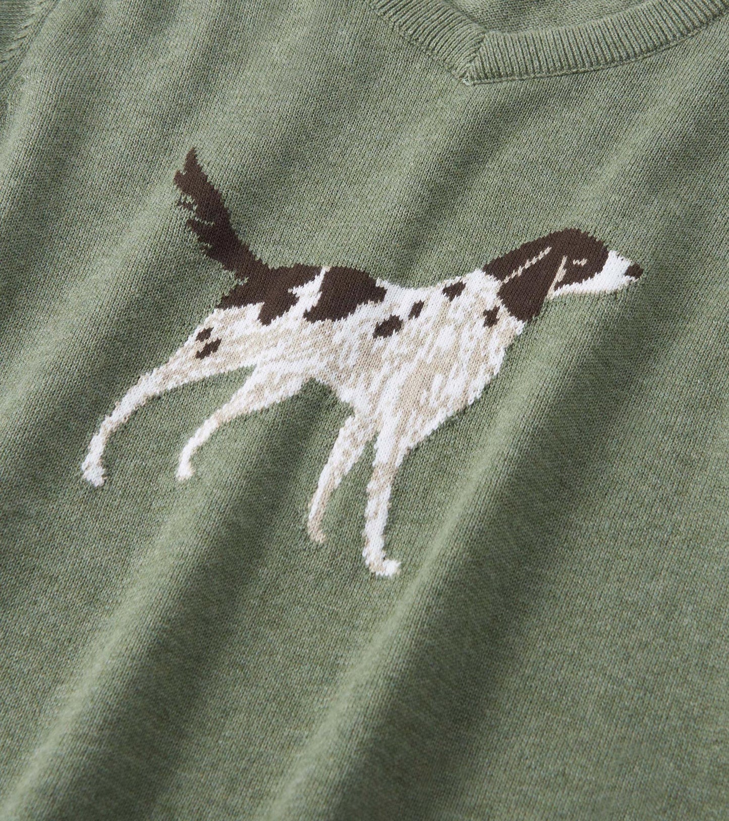 Green V-neck sweater featuring a knitted hunting dog design in brown and white. Soft material suitable for casual wear.