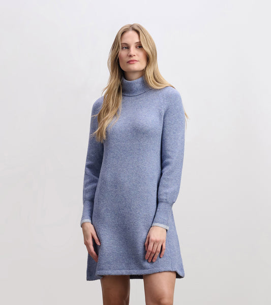 Light denim sweater dress with a turtleneck, long sleeves, and a relaxed fit, featuring a soft, textured fabric.